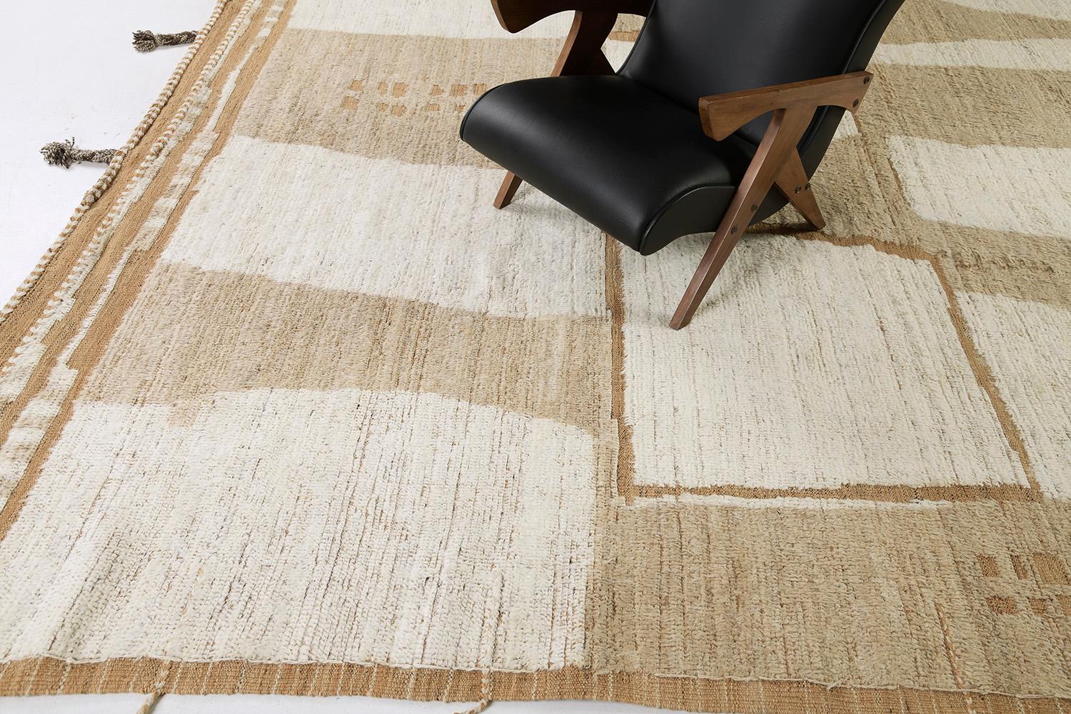 Akal rug is a handwoven wool piece inspired by Scandinavian design elements for the modern design world. The rug's shag balance and harmony, handwoven with playful shades of natural brown and gold-toned pile weave with unique piles of ivory. This