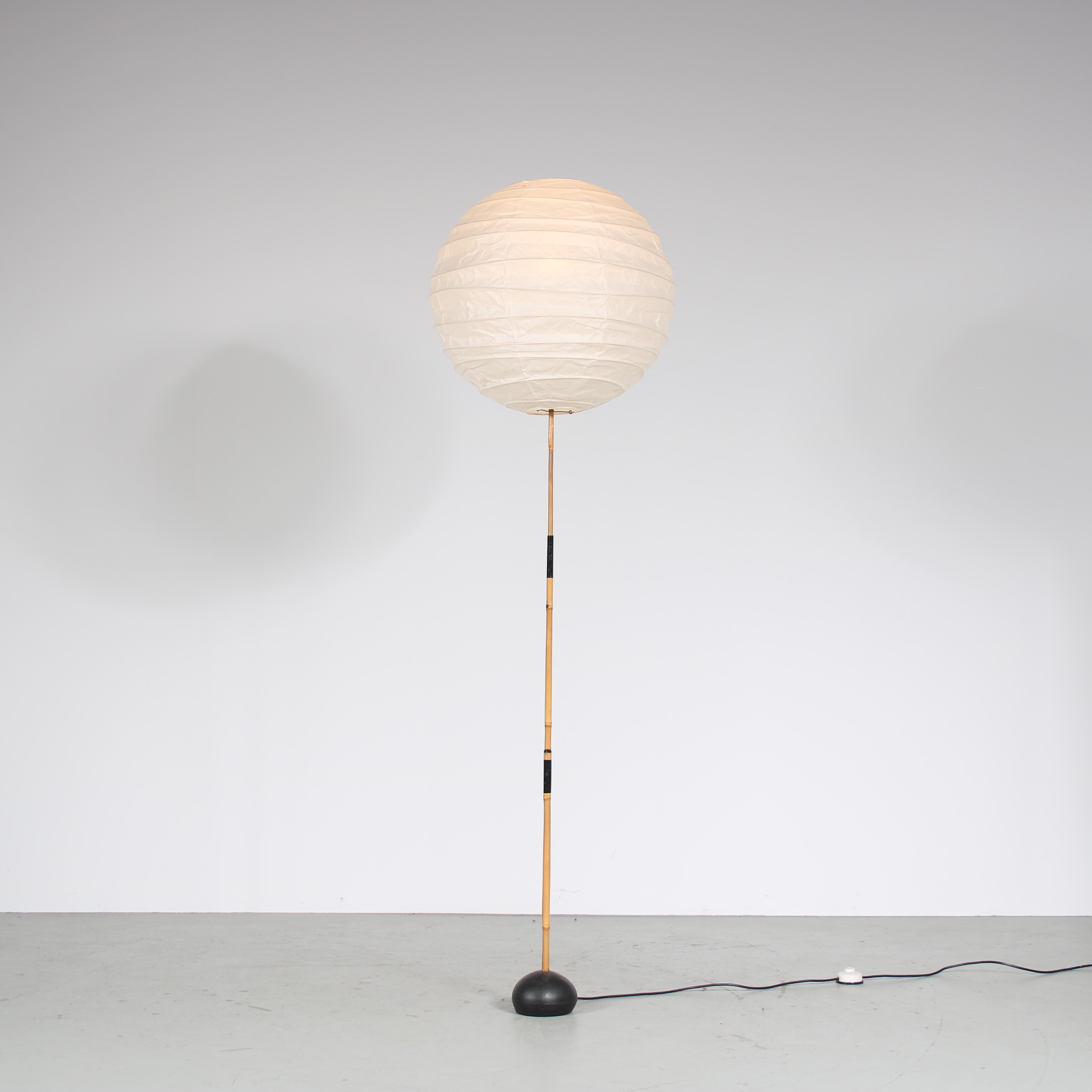 A fantastic “Akari” Floor Lamp designed by Isamu Noguchi and manufactured by Ozeki & Co. in Japan, around 1950.

This exquisite floor lamp showcases the timeless elegance of Isamu Noguchi’s design philosophy. The lamp features a cast iron base