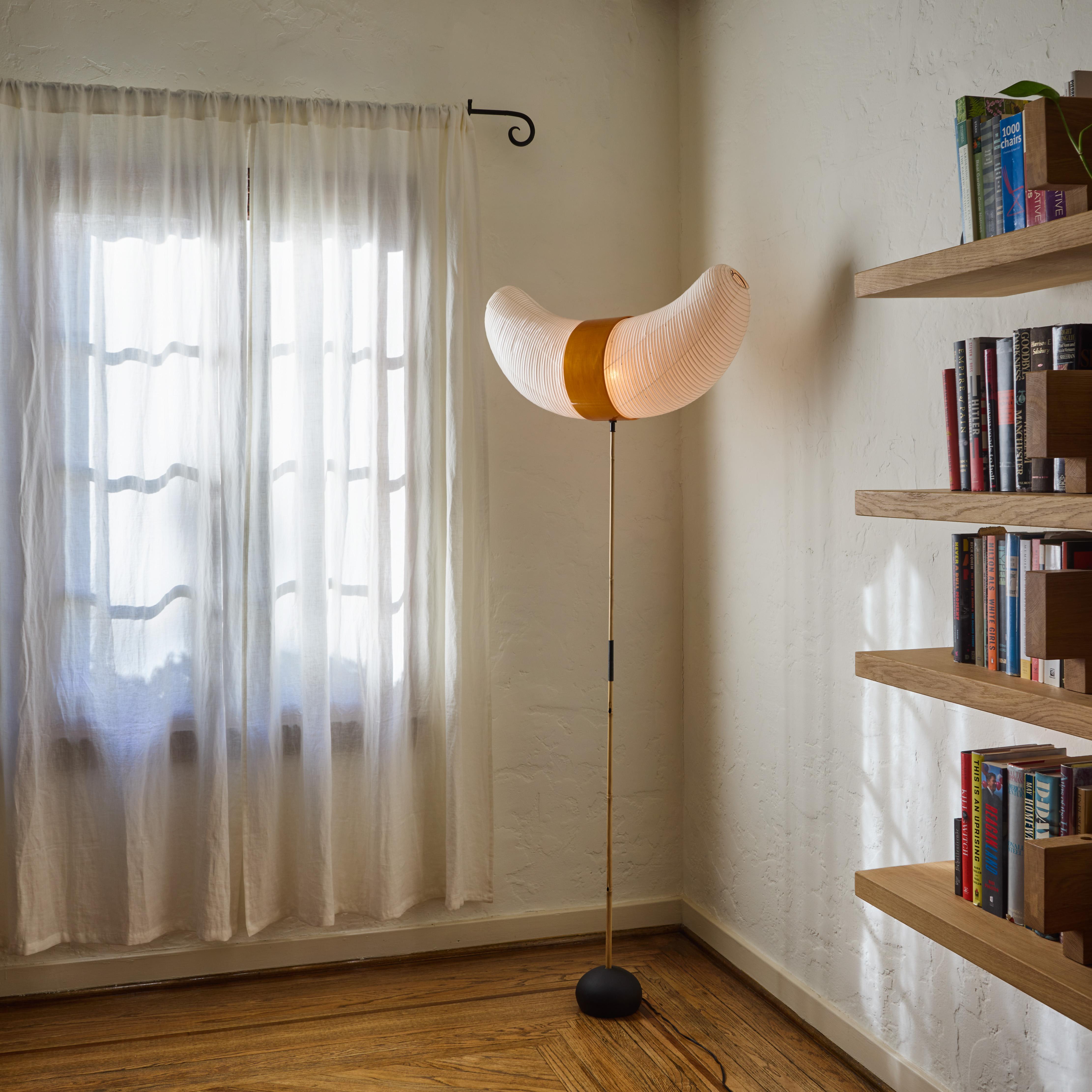 Akari Model BB3/33S 'Horn' Floor Lamp by Isamu Noguchi

Executed in handmade washi paper and bamboo ribs with the manufacturer's stamp. The lamp sits upon a bamboo stem that is in a cast iron pebble-shaped base. The two horn-shaped shades fit into