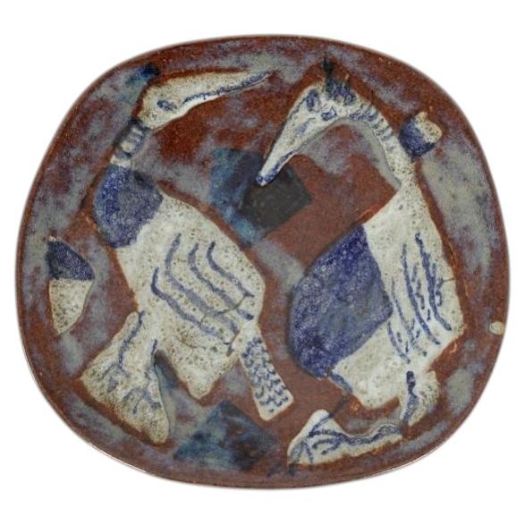 ÅKE HOLM. Bowl plate glazed stoneware with painted animal motif