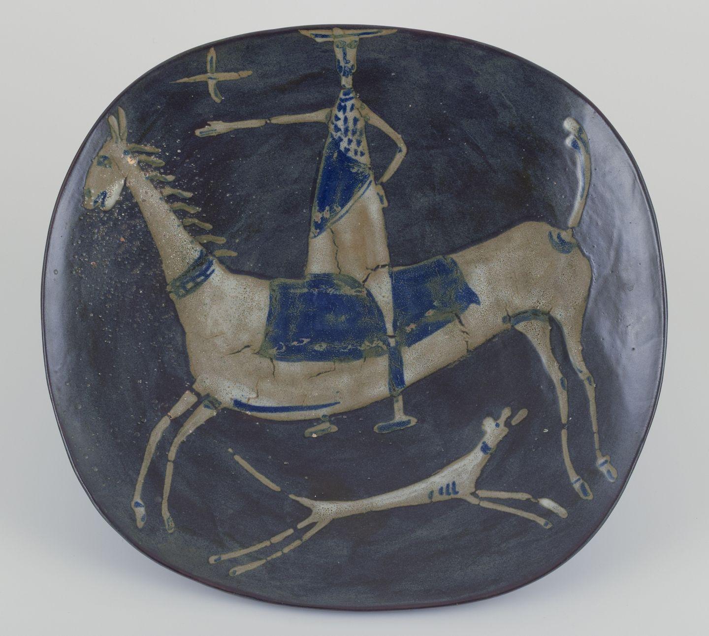 Pre-owned goods are exempt from import duties for U.S. customers. 
Therefore, no import tariffs will be applicable to your purchase.

Åke Holm, Swedish ceramicist.
Large unique ceramic dish with a motif of Don Quixote.
Hand-decorated.
Dating: