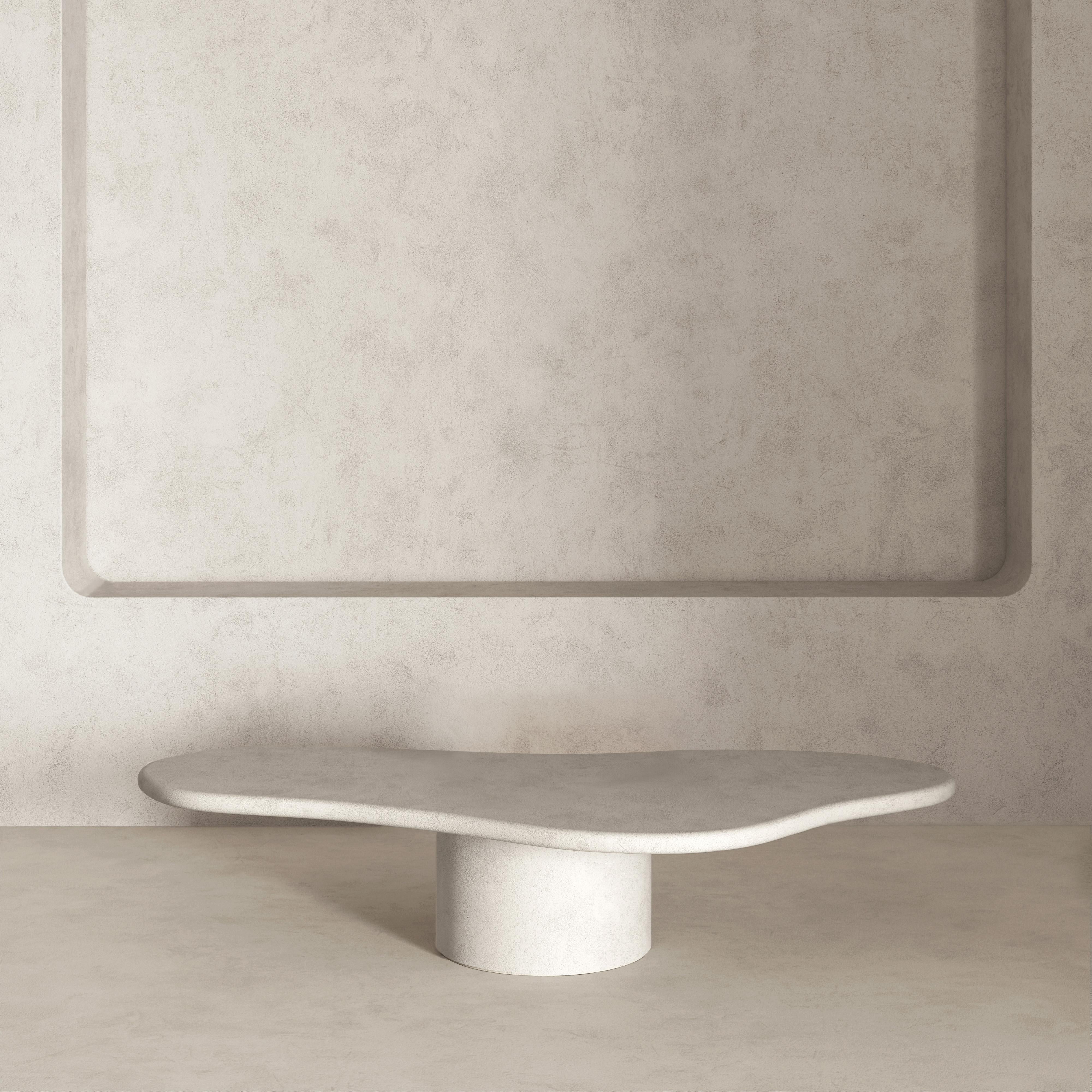 Akemi Low Table by Kasanai
Dimensions: D 79 x W 160 x H 30 cm.
Materials: Lime plaster.
Also available in different dimensions and colors. Please contact us.

At once fluid and structured, the Akemi table is an artistic talking point for any modern