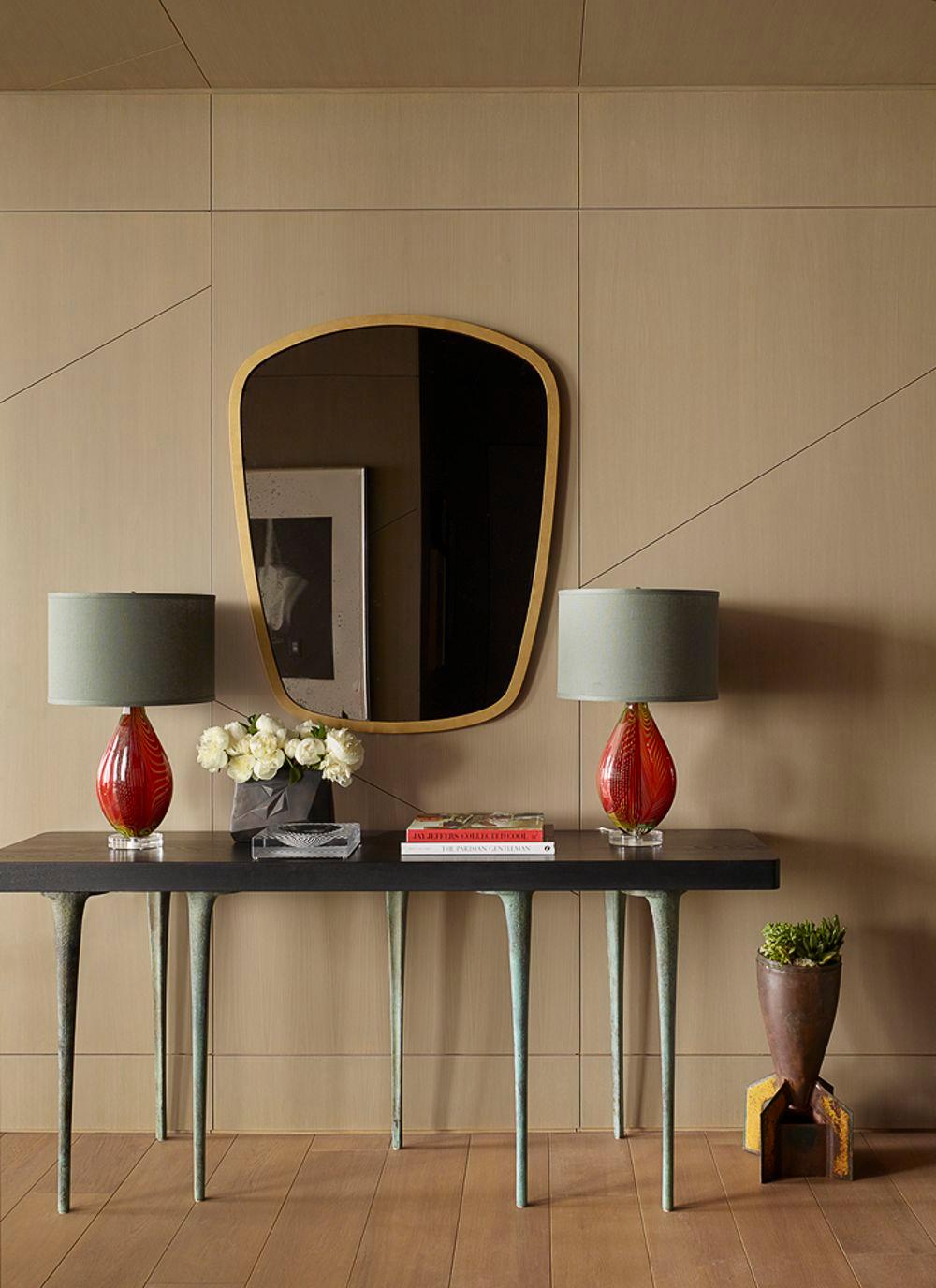 The Thicket Console is an elegant design that pairs fully customizable solid wood tabletops with slender cast metal legs. The tabletops are made to order at our studio in Chicago and are available in an extensive range of species and finishes,