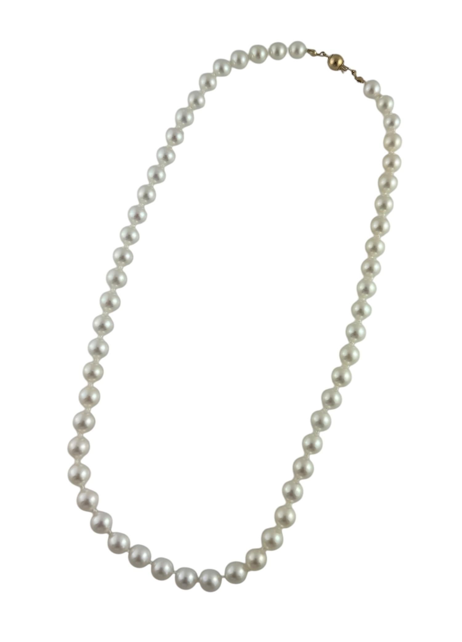 Akoya Cultured Pearl Necklace with 14K Yellow Gold Closure JAGi Certified-

This elegant necklace features 55 Akoya cultured pearls (6.75 mm to 7.25 mm each) with a 14K yellow gold clasp.

Size: 18 inches

Weight: 17.3 dwt/ 27 gr

Stamped: 585

JAGi