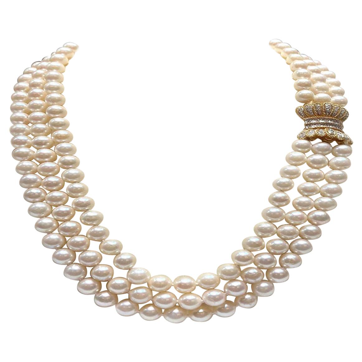 Akoya Japanese Pearls with a 14k Gold Clasp with Diamonds