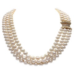 Akoya Japanese Pearls with a 14k Gold Clasp with Diamonds