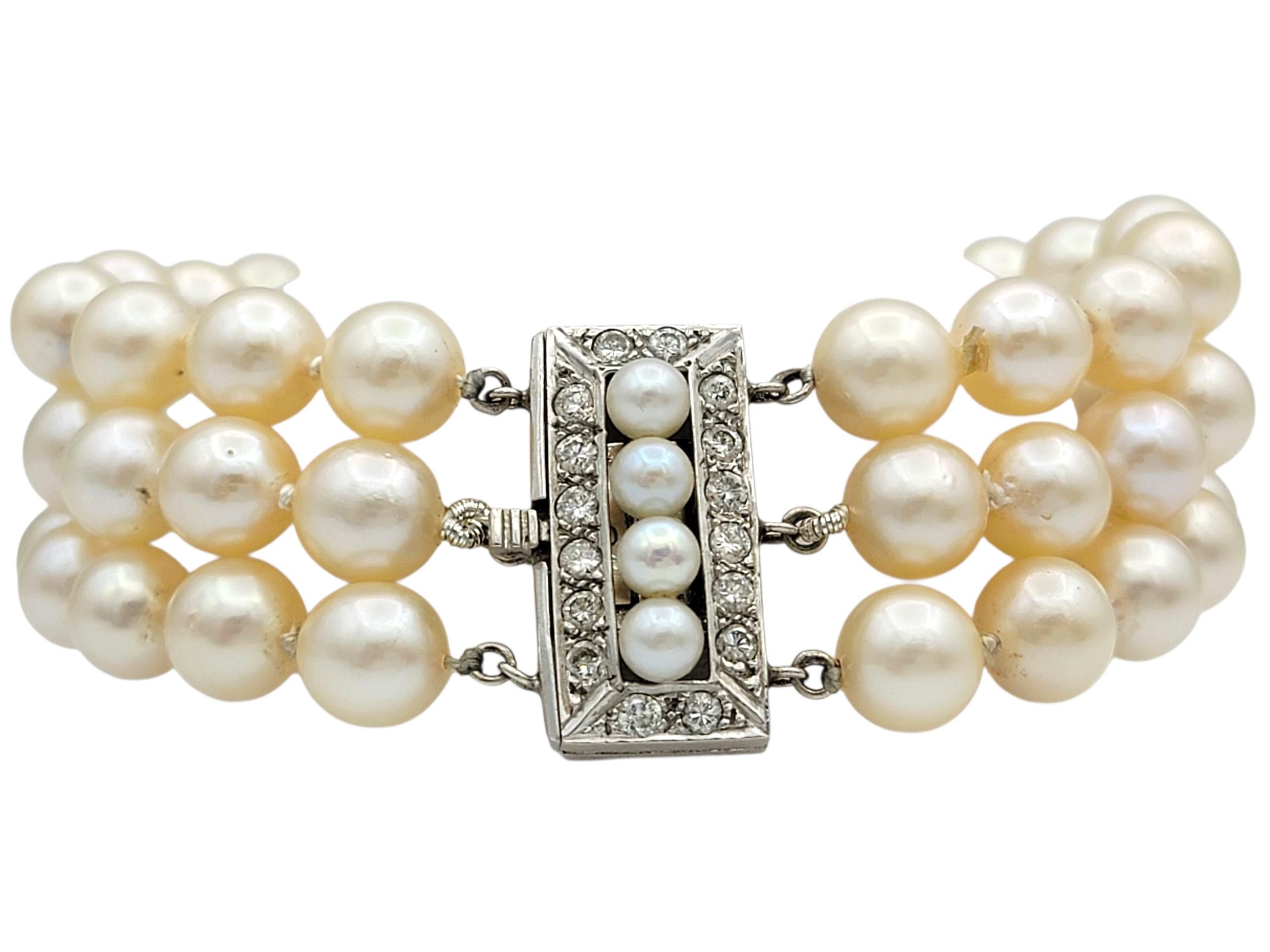 This elegant bracelet showcases luminous white Akoya pearls, each with a soft pinkish overtone and very good luster. Their refined glow is complemented by sparkling round-cut diamonds, adding a delicate brilliance to the piece.

Set in 14 karat