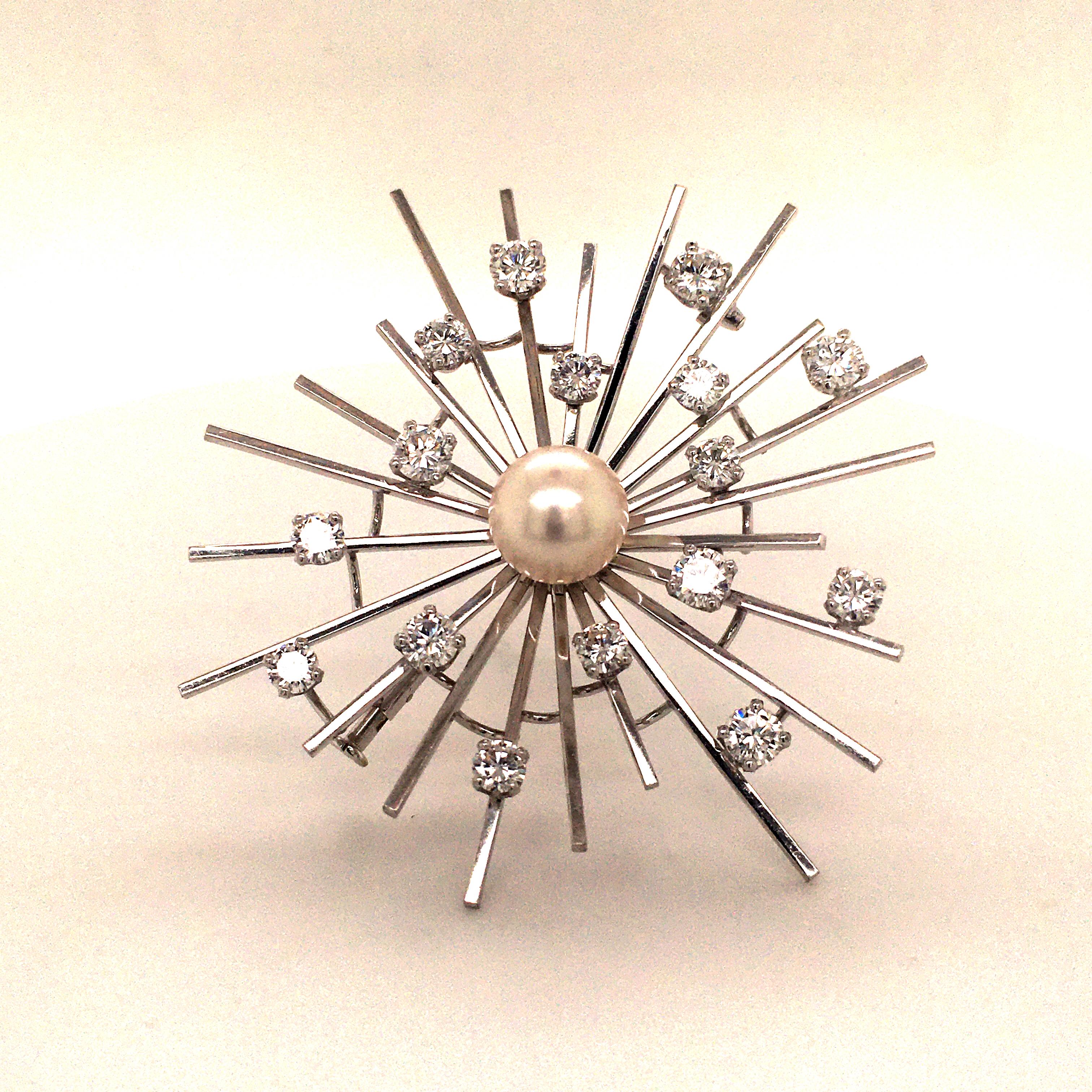 Remarkable brooch in white gold 750 with 1 white and round akoya cultured pearl with a diameter of approx. 9.5 mm. Additionally set with 16 brilliant cut diamonds totaling approx. 3.10 ct of G/H-vs quality.

Please, ask for additional information if