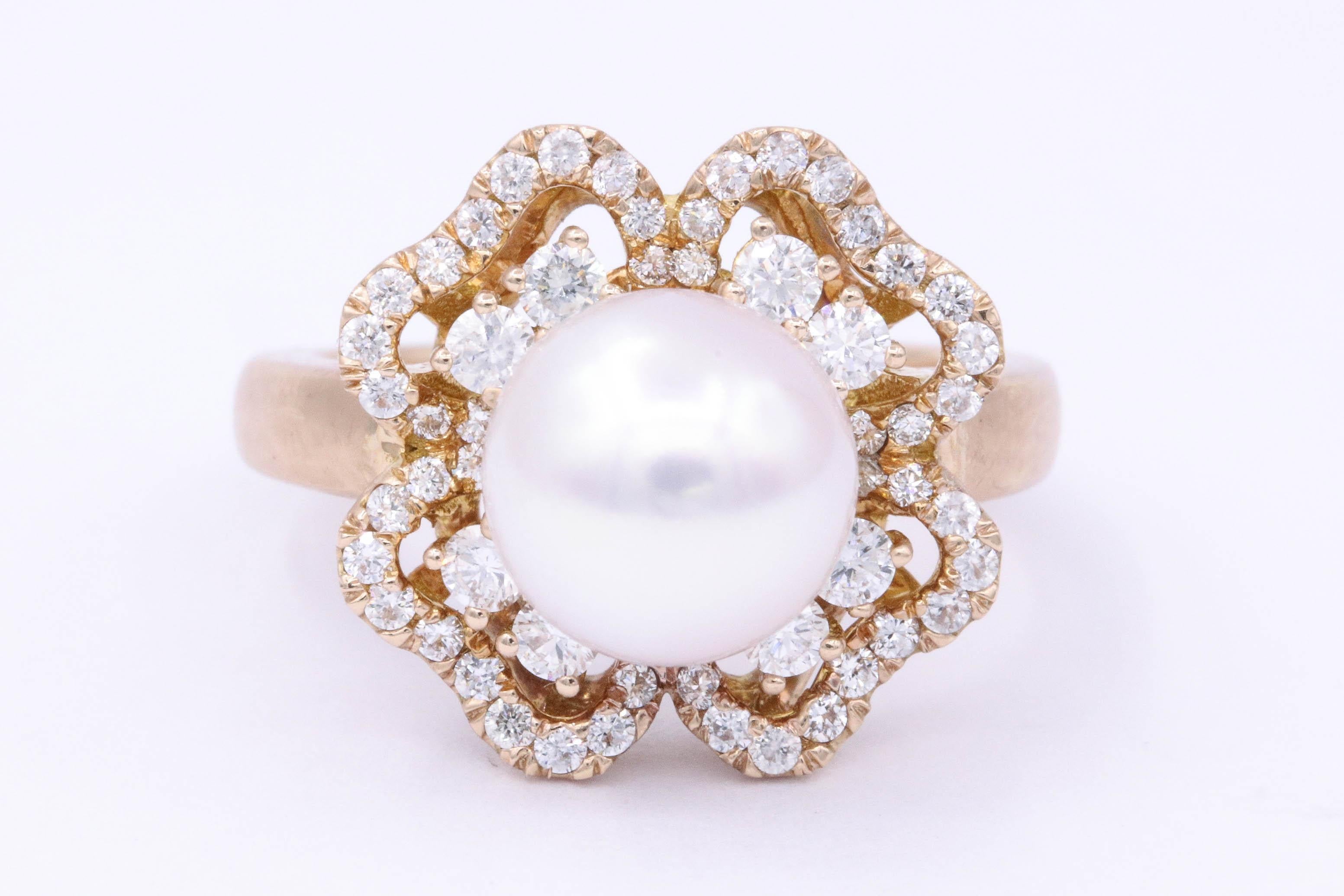 18K Rose gold featuring 0.74 round diamond F-G SI Quality
Akoya white Japanese pearl with pink overtone 9mm
Size 6 
We can order it in your size  or we will re size it fee of charge 