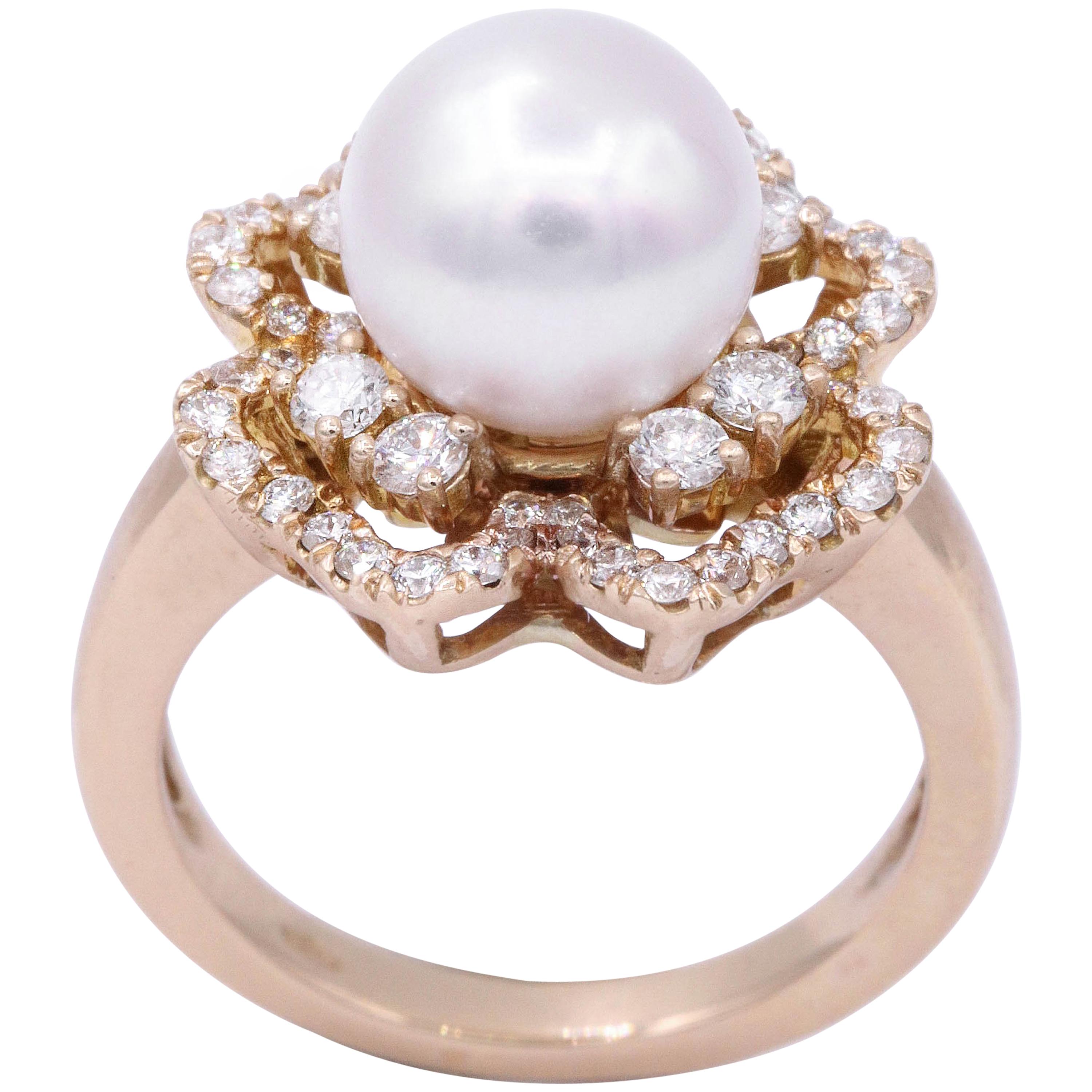 18K Rose gold featuring 0.74 round diamond F-G SI Quality
Akoya white Japanese pearl with pink overtone 9mm
Size 6 
We can order it in your size  or we will re size it fee of charge 