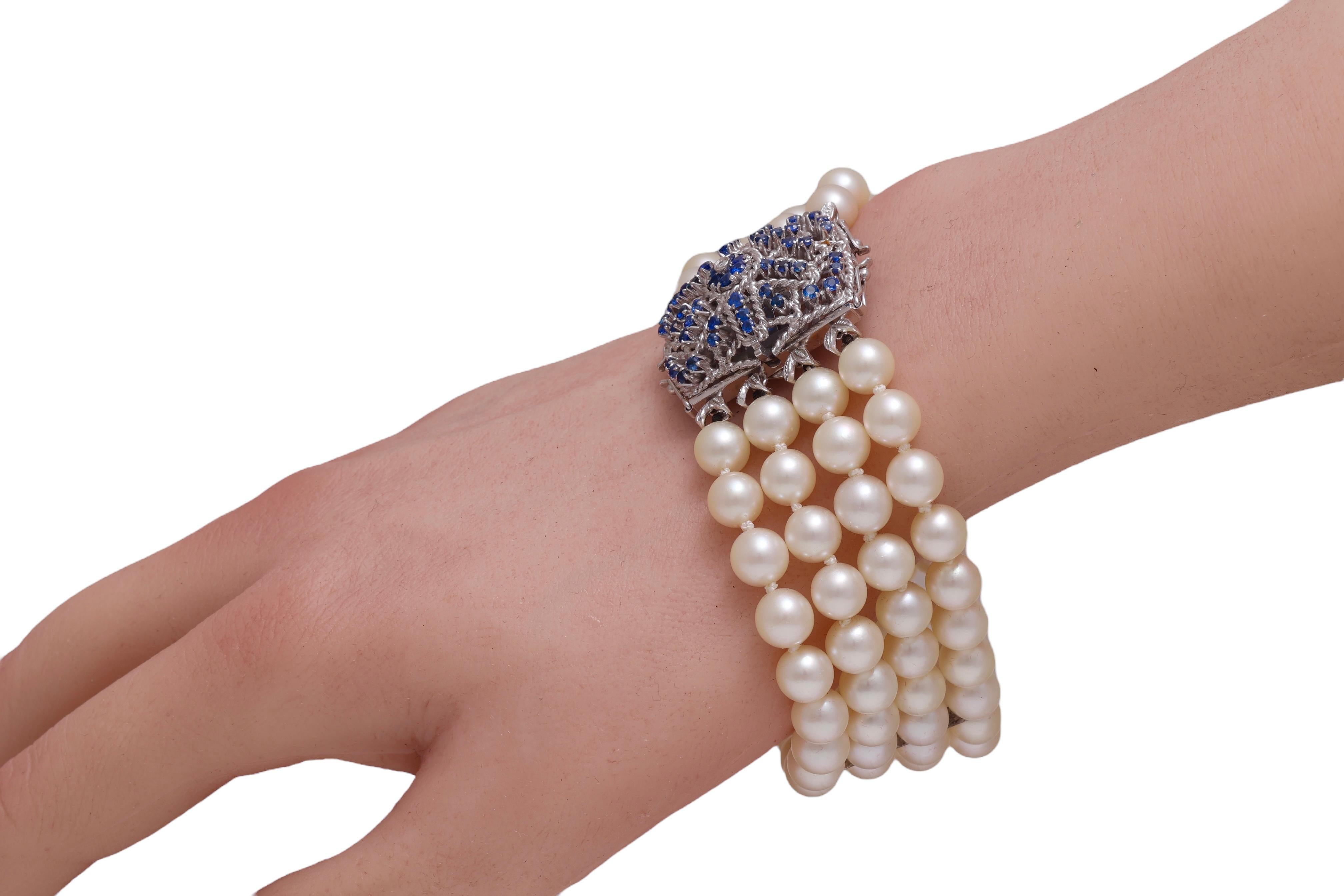 Gorgeous Japanese Akoya Pearl Bracelet with 18 kt. White Gold Locker with Sapphires & a Diamond

Sapphires: 52 blue semi precious stones, together 1.35 ct.

Diamond: 1 brilliant cut diamond 0.03 ct.

Pearls: Japanese Akoya Top Quality , 96 pearls