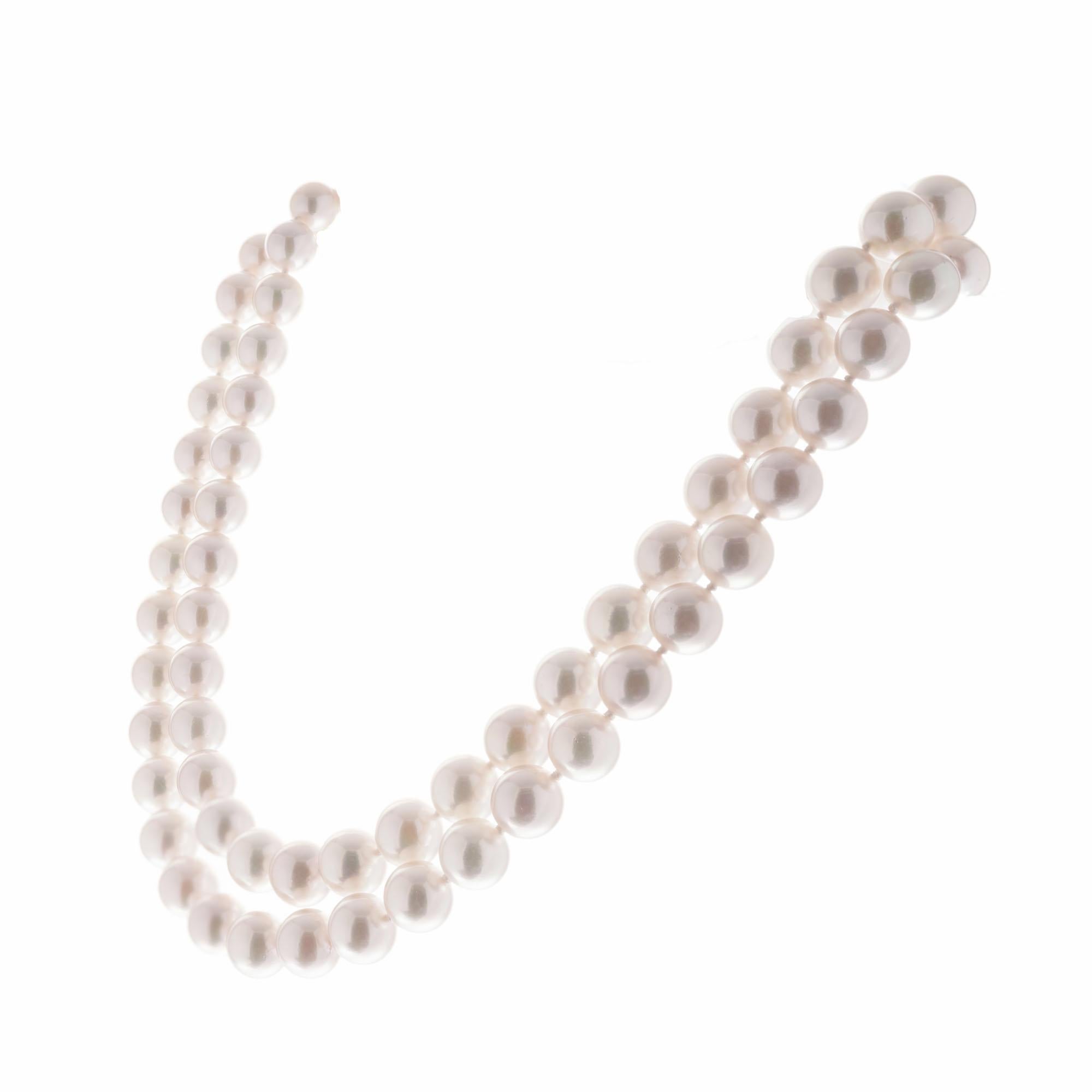 82 round Akoya pearl Necklace with an 18k white gold ball accented with 21 round diamonds. 30 inches long. 

82 round Akoya pearls, 8-8.5mm
21 round diamonds, approx total weight: .33 G, VS
Length: 30 inches
18k white gold