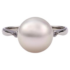 Anello in platino con diamante e perla Akoya