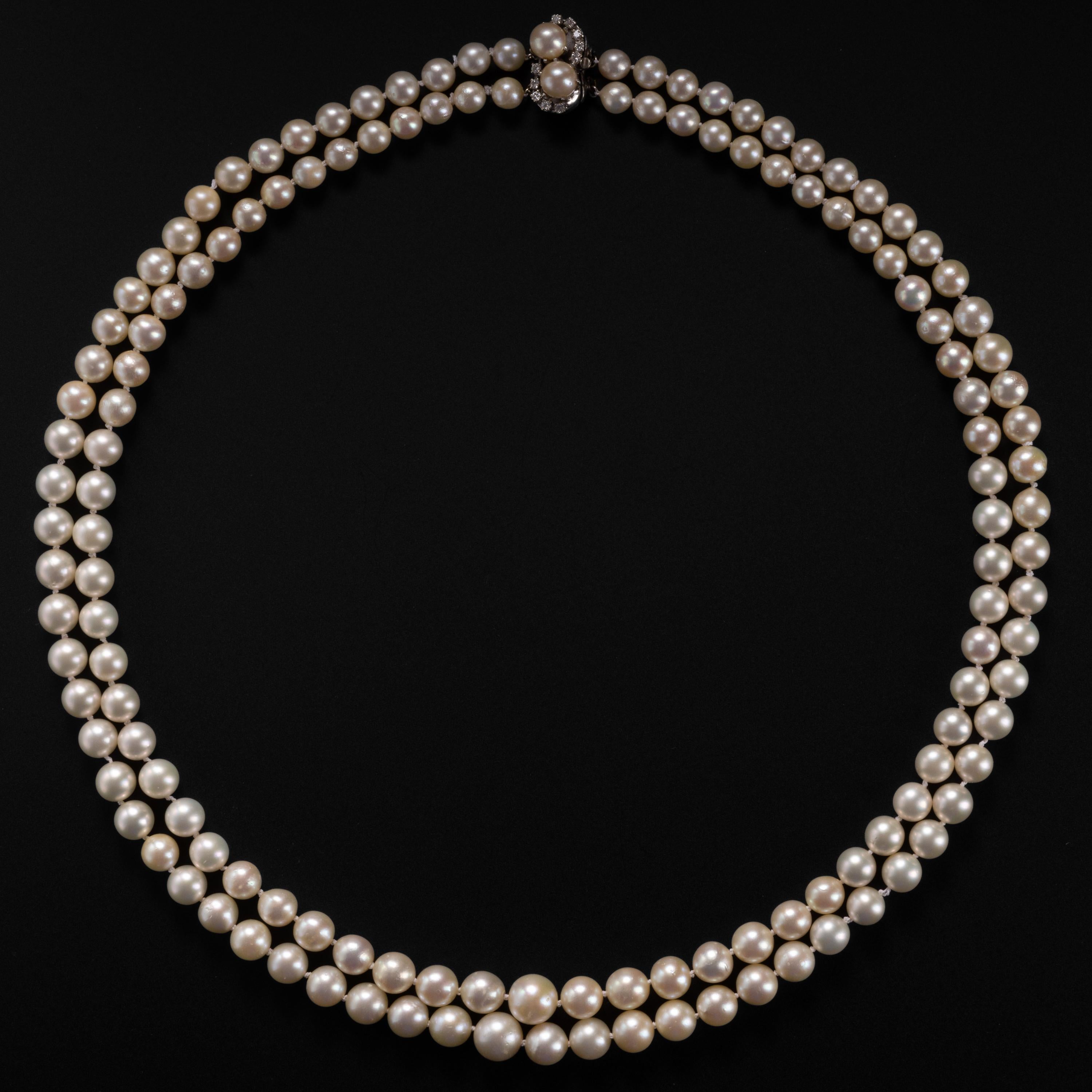 This luxuriously long and fine graduated strand of Midcentury (circa 1950s) cultured Akoya pearls features large and luminous pearls in a length rarely encountered. A pristine necklace from the era when the finest cultured Akoya pearls were created.