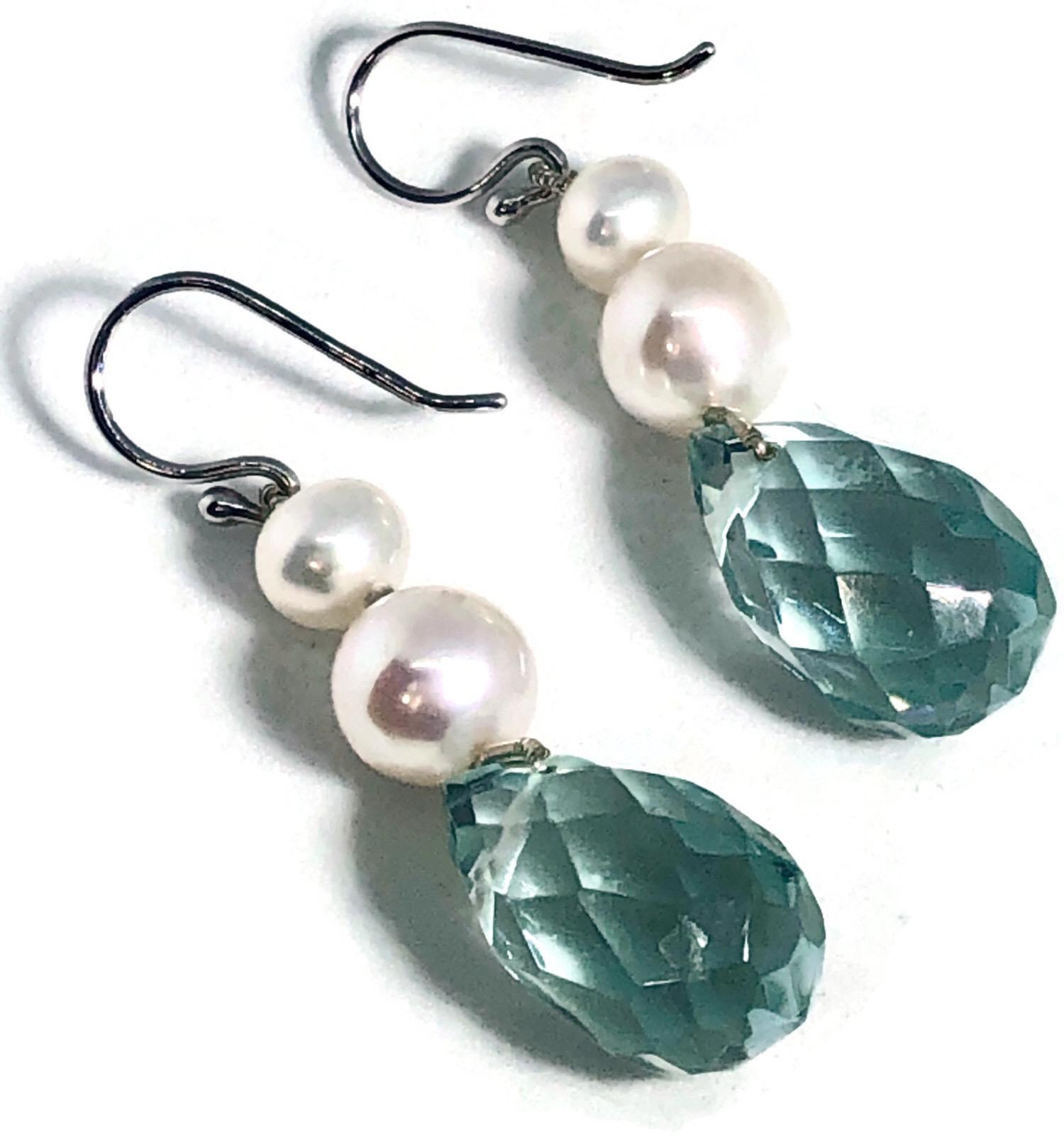 Beautiful by themselves with a simple pearl necklace or as a matching earring to the Akoya pearl necklace with 5 faceted briolettes, these earrings are so flattering and comfortable to wear.

Appropriate for a formal affair or everyday use, the blue