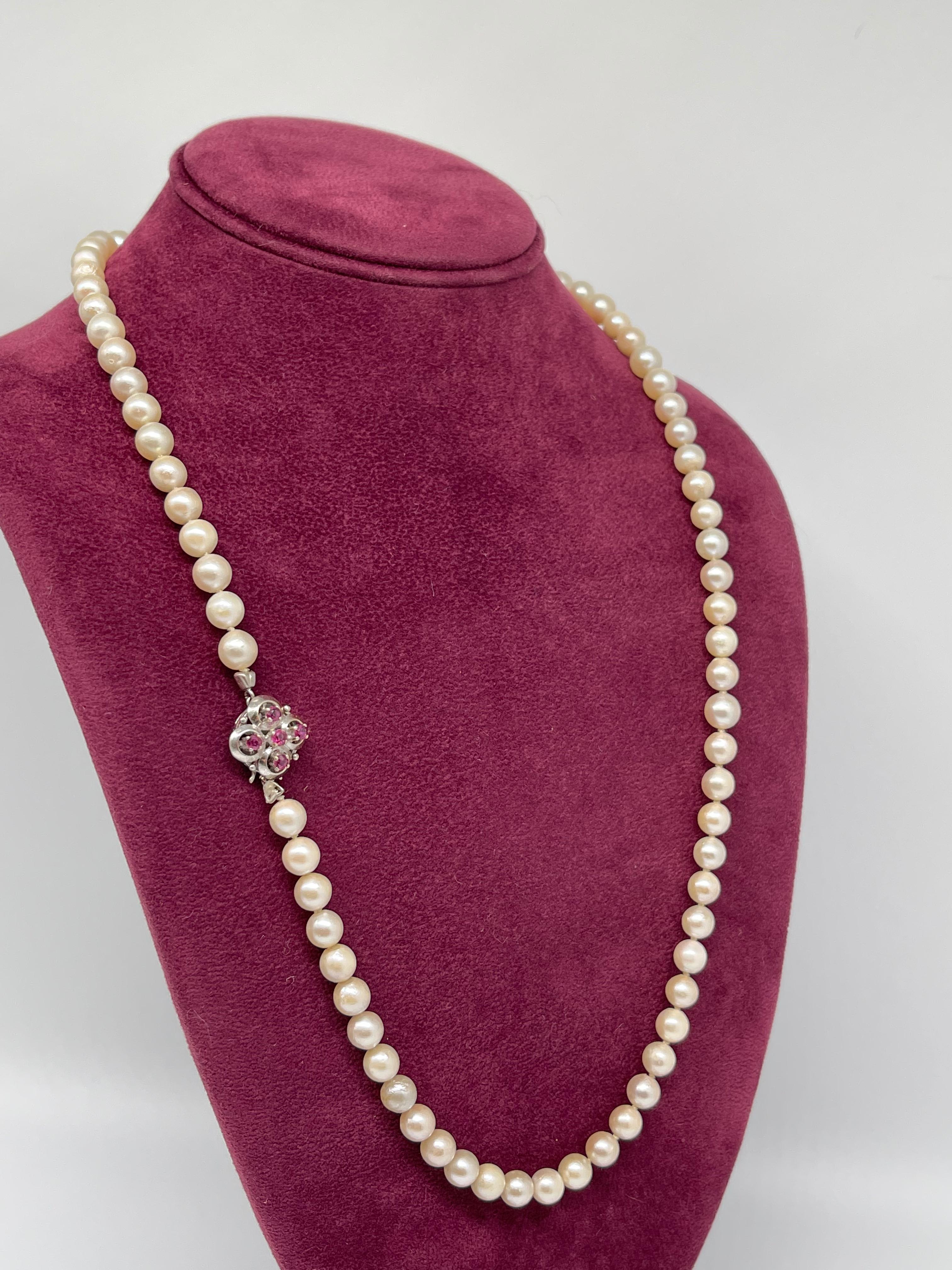Modern Akoya Pearl Necklace with 14 kt. White Gold and Ruby Clasp For Sale
