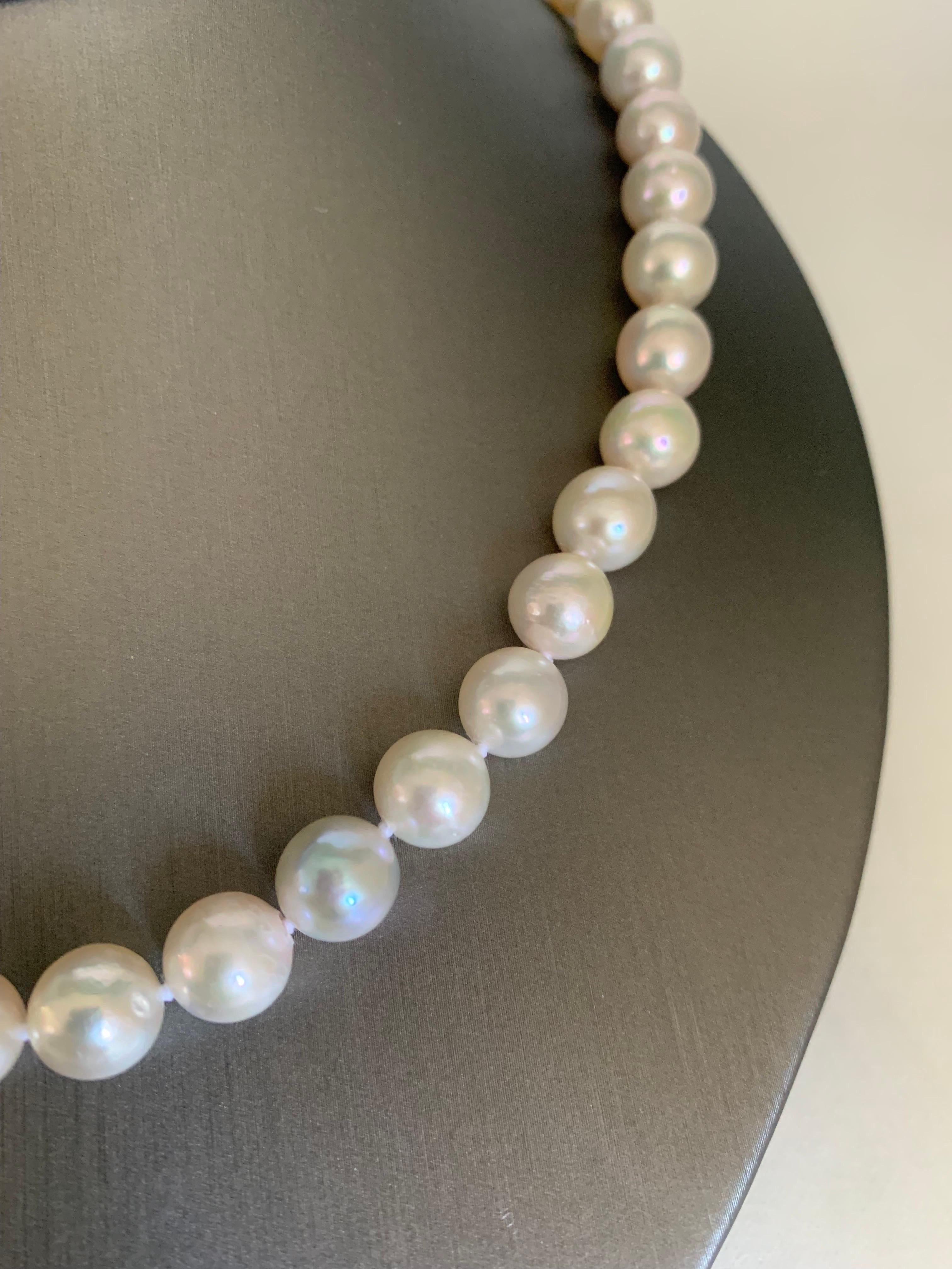 Elevate your look with a timeless pearl necklace. This 17-18 inches in length strand necklace is fully knotted and hand strung with matching silk cord. The necklace comprises 44 lustrous Akoya pearls measuring 9mm and closure is 14K white gold