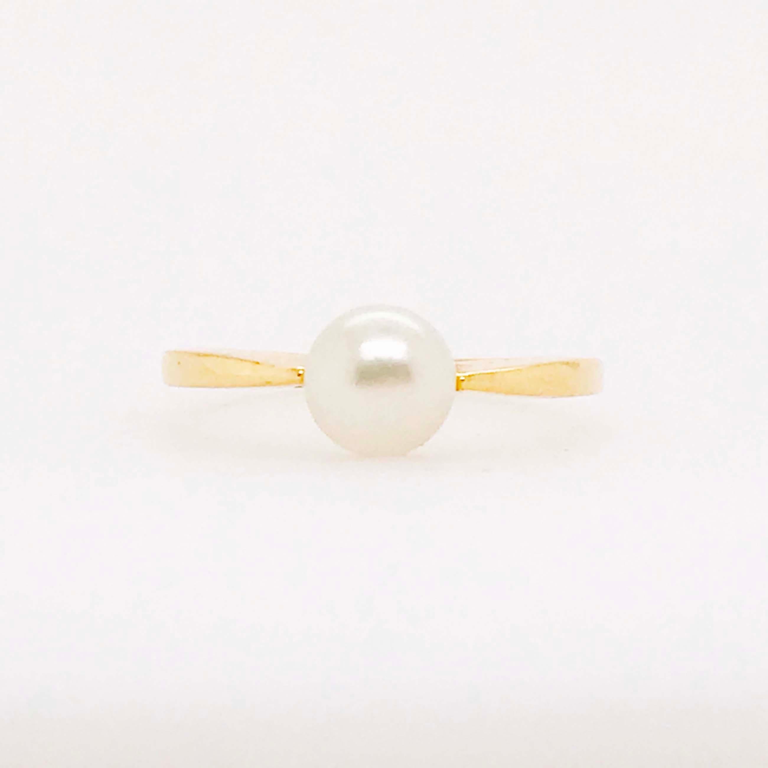 This stunning Akoya pearl ring is so adorable and fun! With a genuine round Akoya pearl mounted in the center. The pearl is excellent quality and 6mm - 6.5mm round. The color is a creamy pearl white and pairs perfectly with the 14k rich yellow gold.