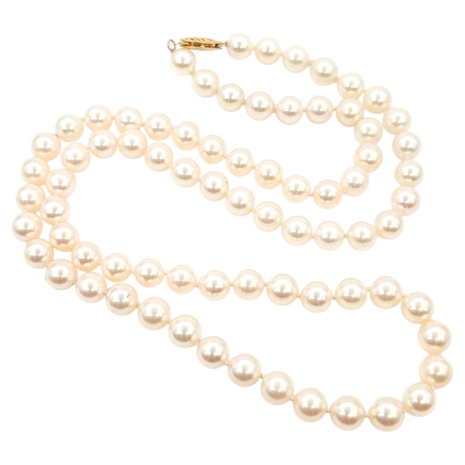 Collana con fili di perle Akoya in oro giallo 14k