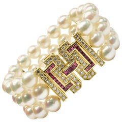 Akoya Pearls Bacelet with Rubies and Diamonds Gold Clasp