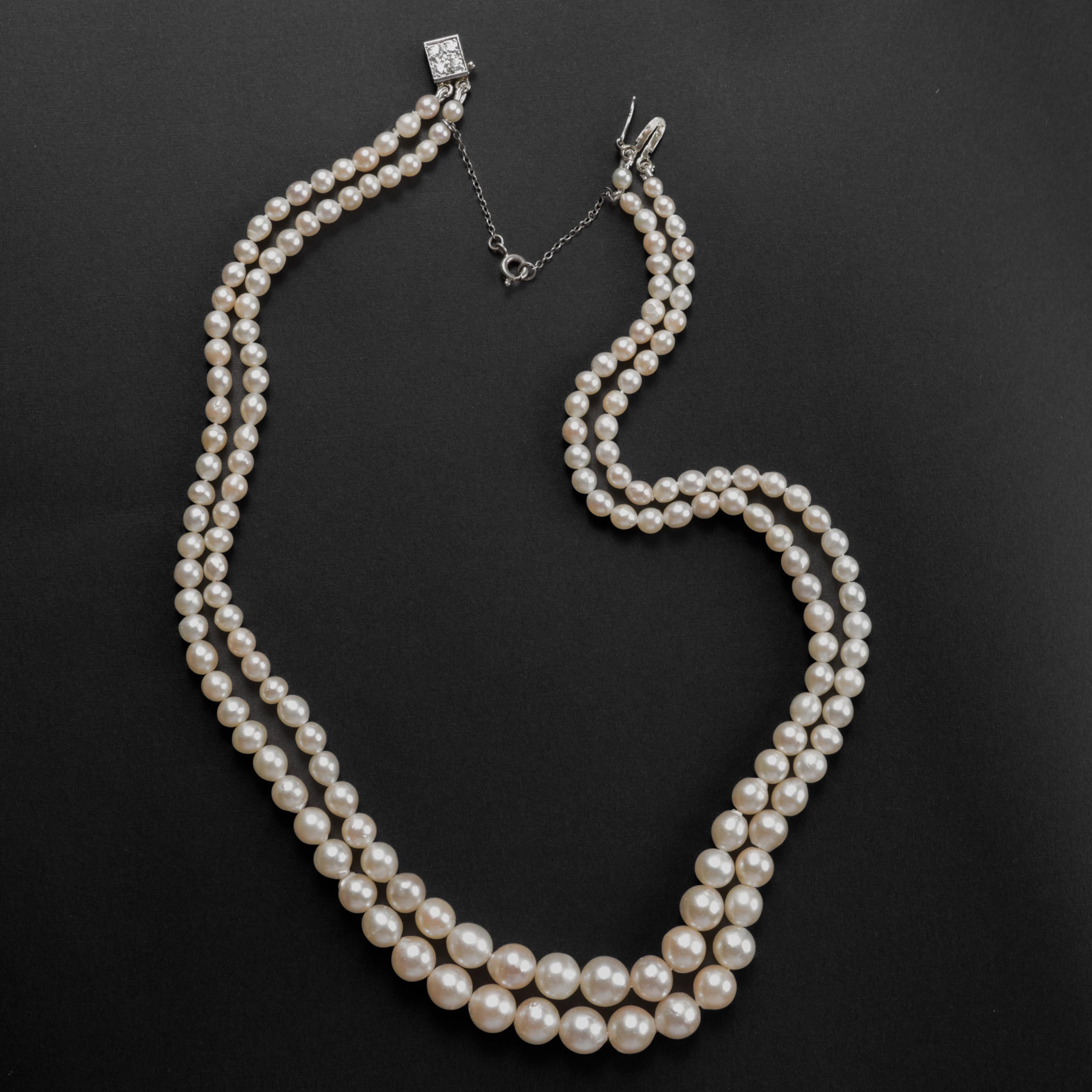 This late Art Deco era (circa 1939) double strand of cultured Akoya pearls represents the finest, most luxurious pearls of their day. Today, we are accustomed to perfectly spherical pearls with a blemish-free surface. But when this necklace was