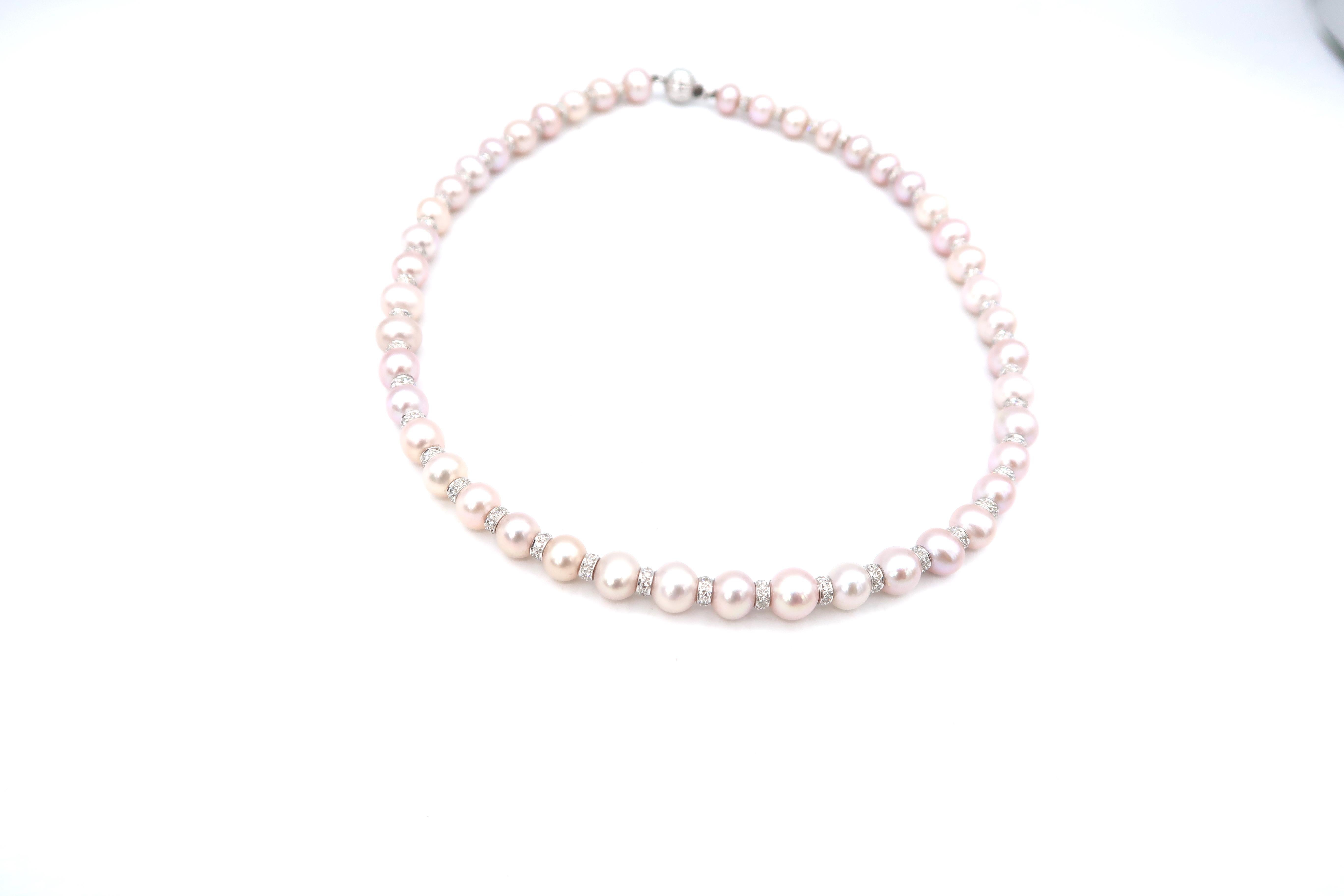 Single Strand Akoya Pink Pearl Necklace with Diamond Spacers in Between

Length: 15.75