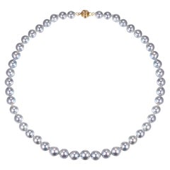 Akoya Silver Blue Cultured Baroque Pearl with 14 Karat Yellow Clasp