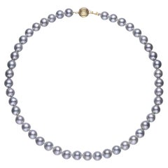 Akoya Silver Blue Cultured Baroque Pearl with 14 Karat Yellow Clasp