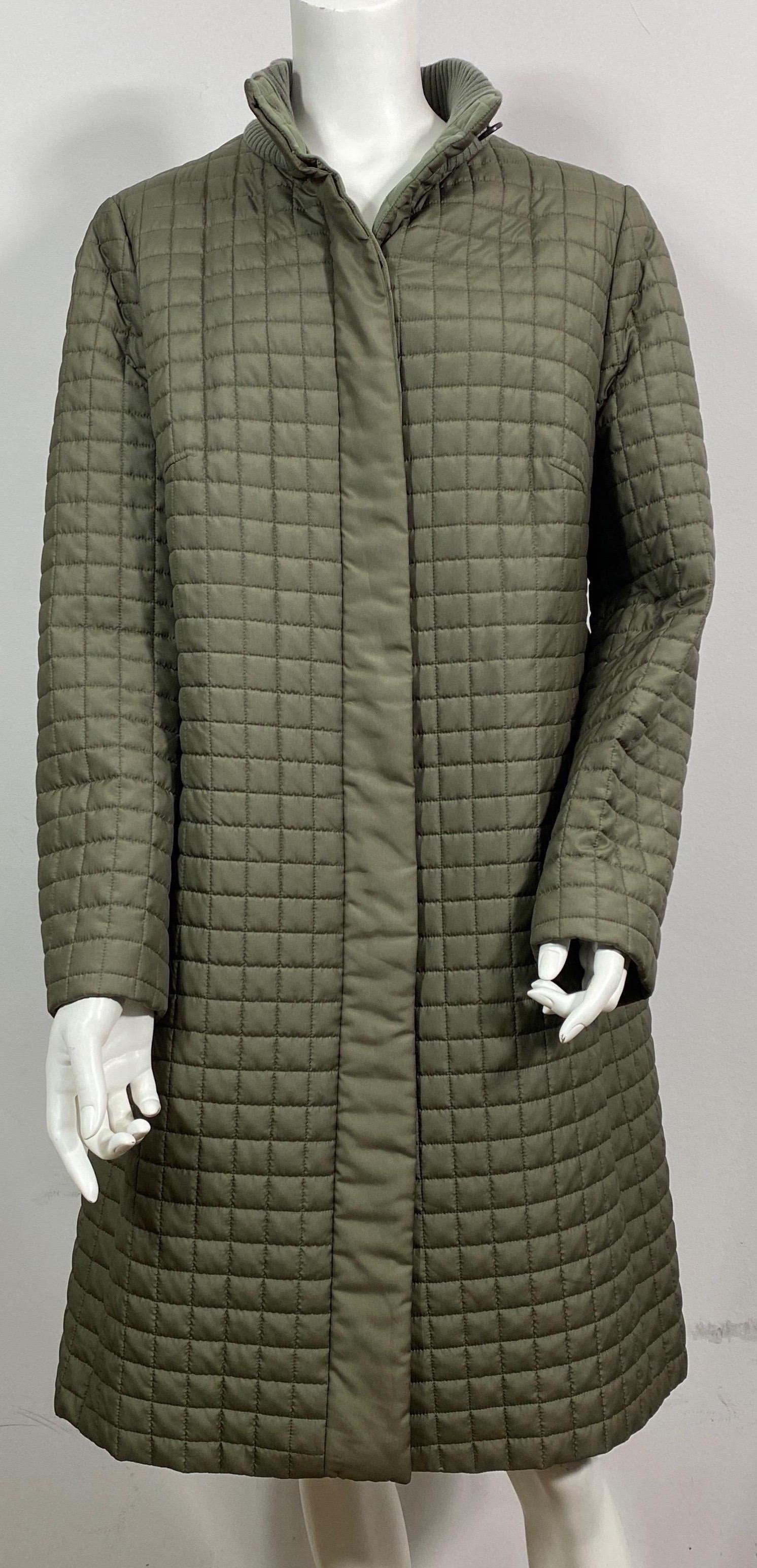 Akris Sage Silk Quilted Puffer Coat-Size 48 This 1990’s quilted silk puffer coat is marked a 48 (16 US), however I do believe the coat could fit more like a large and even possible a medium if it is meant to be worn over sweaters, etc. It has an