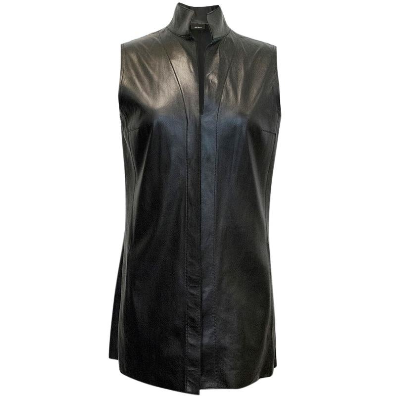 Akris Black Leather Vest with six buttons down the centre front. 

This item is in great condition.

Size: 38

Condition: 9/10

Measurements are taken with the item lying flat, seam to seam.
Approximate measurements:

Bust Width: 44cm
Length: 73.5cm