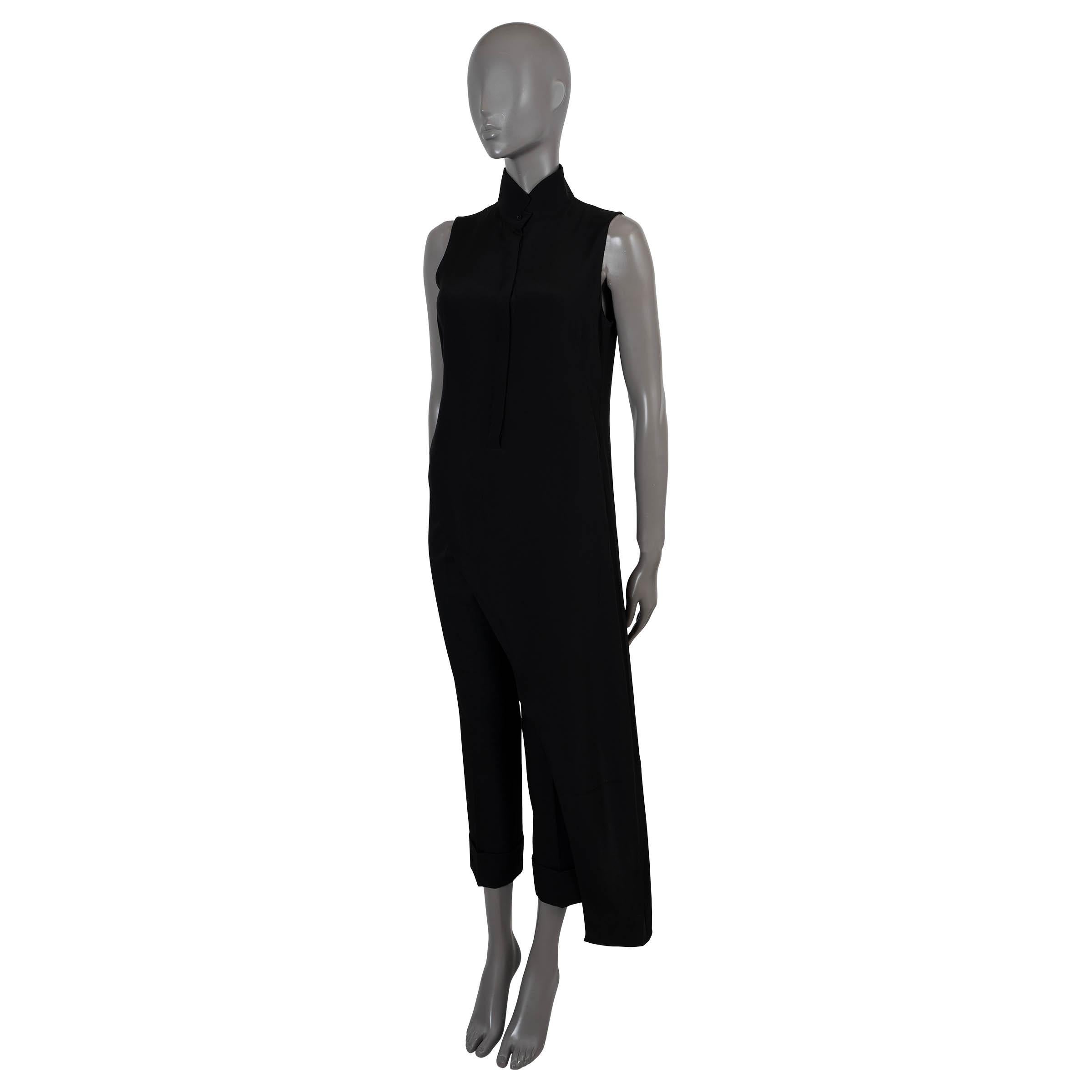100% authentic Akris asymmetric sleeveless tunic blouse in black silk (100%) with a cut-out back and concealed front buttons. Unlined. Has been worn and is in excellent condition. 

2019 Spring/Summer

Measurements
Tag Size	US 4/FR 36/DE 34/UK 8/IT