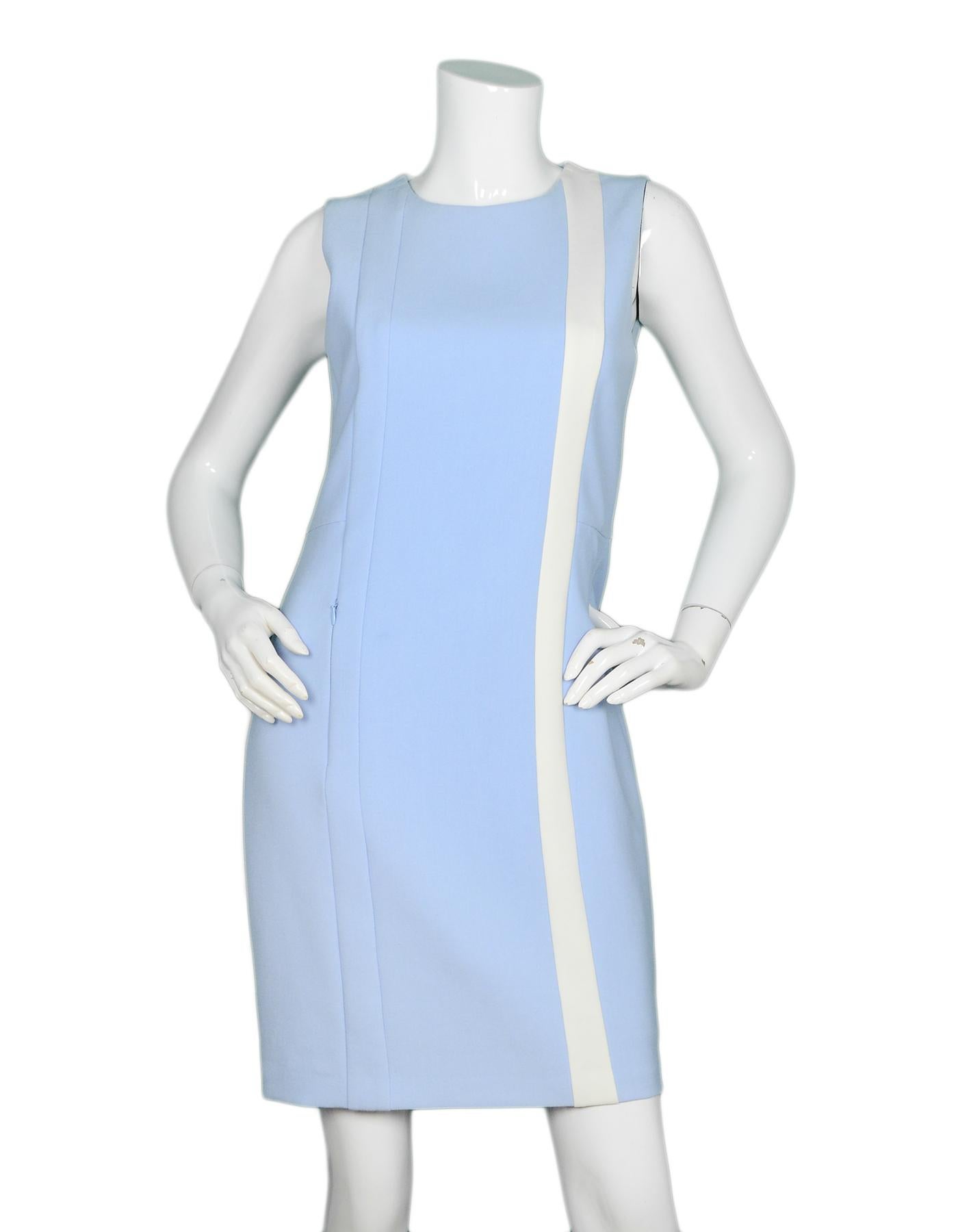 Akris Blue Sleeveless Dress w/ White Stripe sz 6

Made In: Romania
Color: Blue
Materials: 63% polyester, 27% viscose, 7% cotton 3% elastane
Lining: 100% viscose
Opening/Closure: Hidden back zipper closure 
Overall Condition: Excellent pre-owned