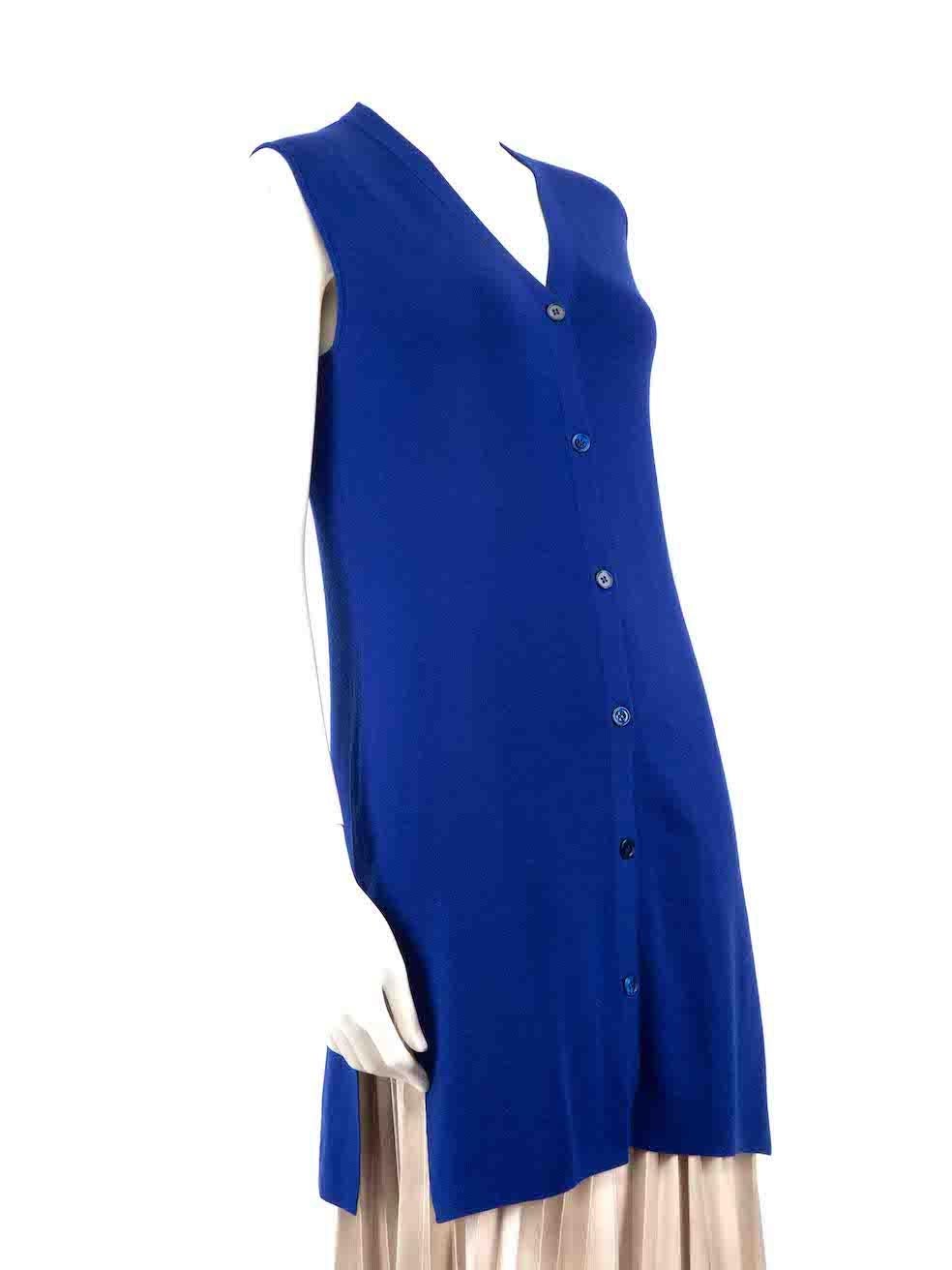 CONDITION is Very good. Hardly any visible wear to the cardigan is evident on this used Akris designer resale item.
 
 
 
 Details
 
 
 Blue
 
 Wool
 
 Cardigan
 
 Sleeveless
 
 Knitted and stretchy
 
 Front button up closure
 
 Side slits
 
 
 
 
