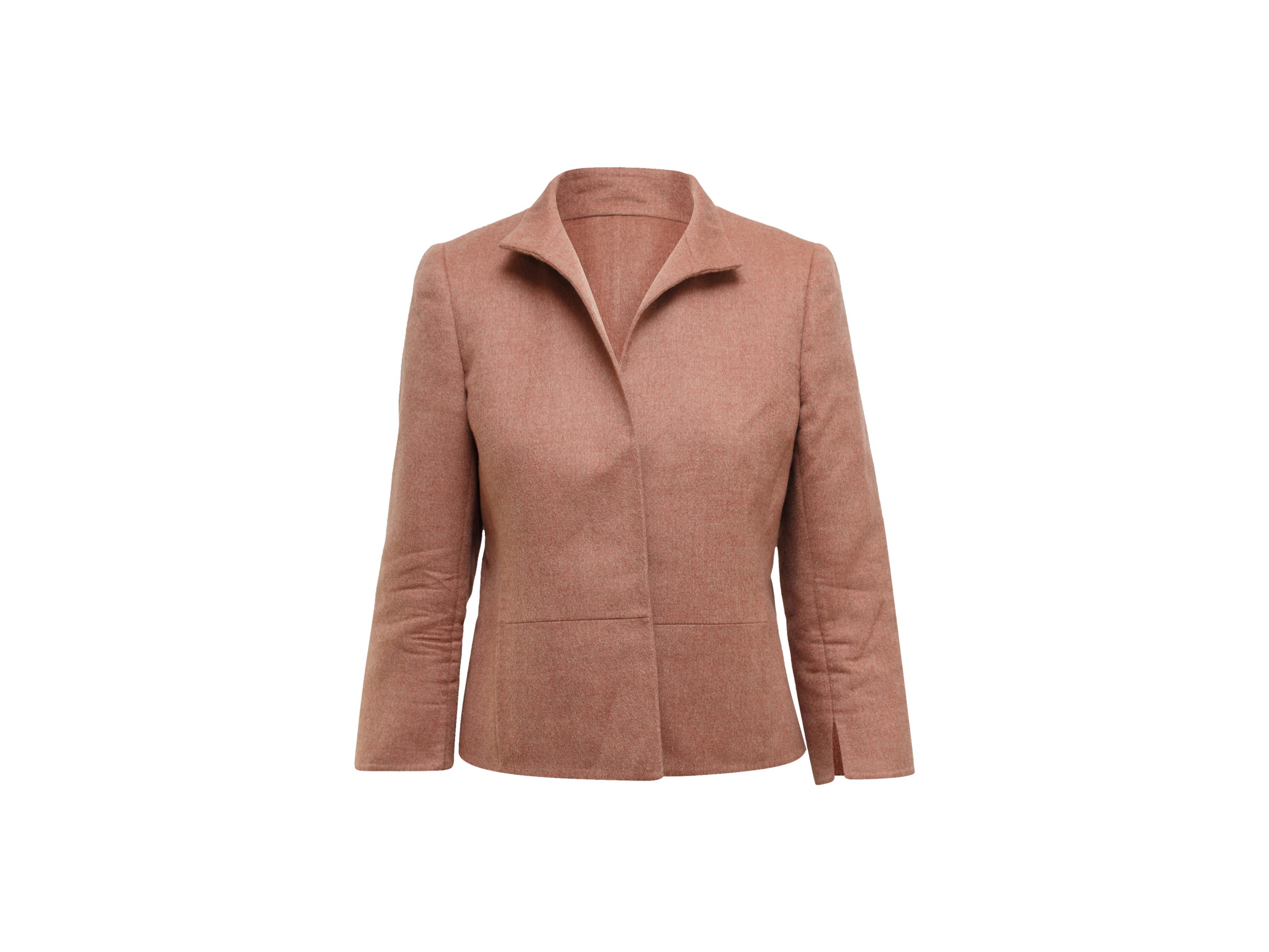 Product details: Dusty rose cashmere jacket by Akris. V-neck. Structured shoulders. Concealed closure at front. 36