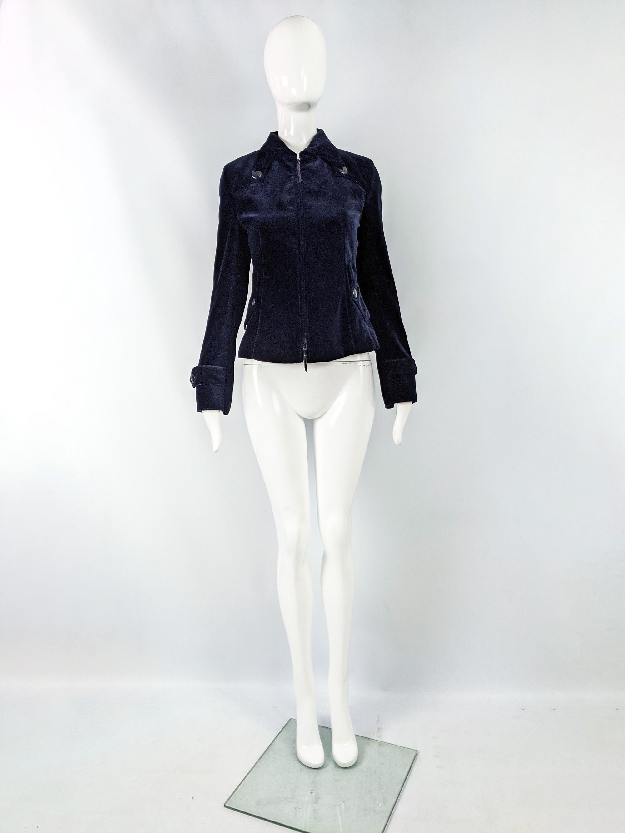 A chic vintage womens jacket from the 90s by luxury Swiss fashion house, Akris for high end department store, Bergdorf Goodman. In a deep midnight blue velvet, highlighted with beautiful top stitching. It has a zip front, lightly nipped waist and