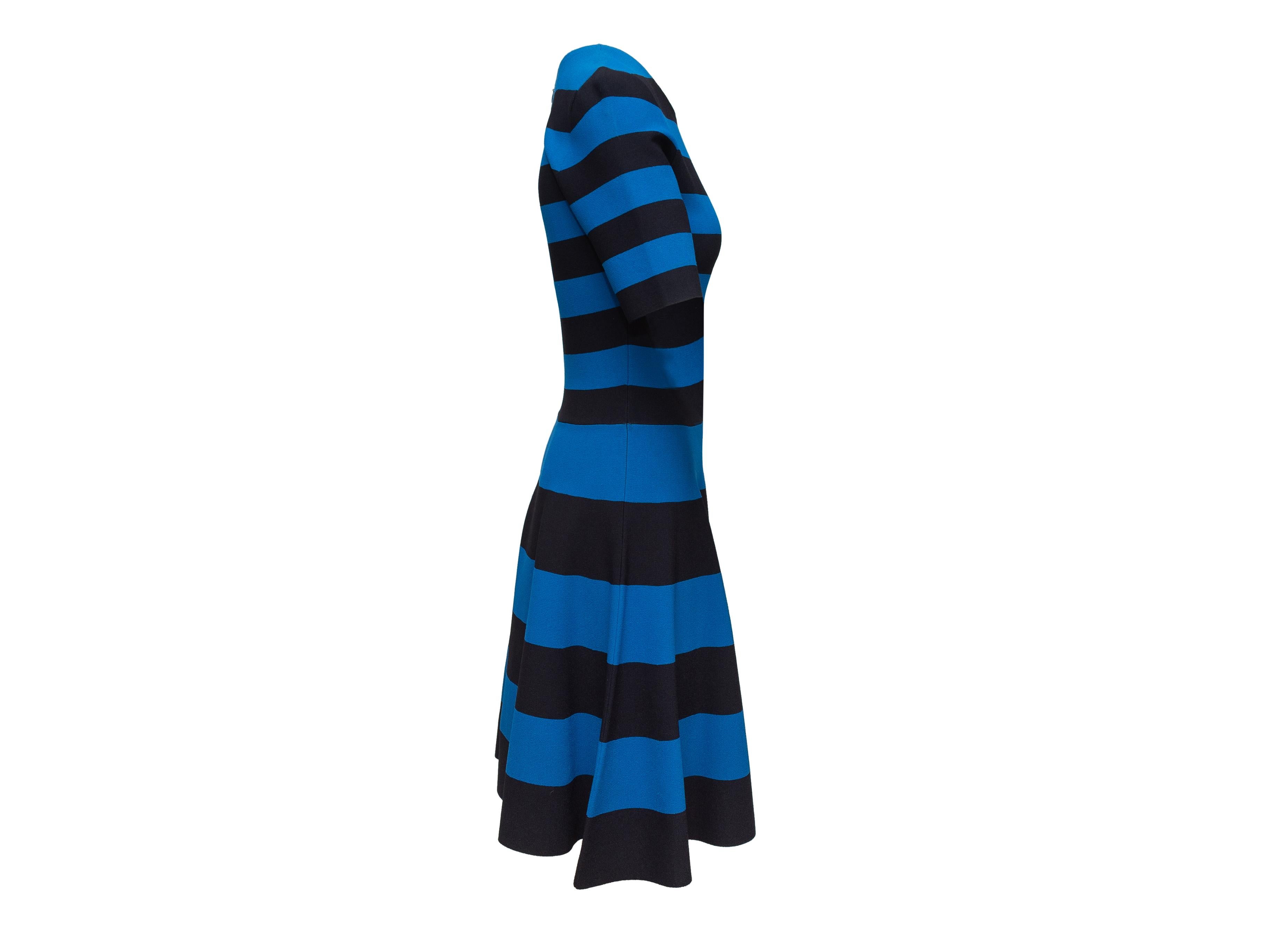 Product details: Blue and black striped A-line dress by Akris Punto. Crew neck. Short sleeves. Zip closure at back. 29