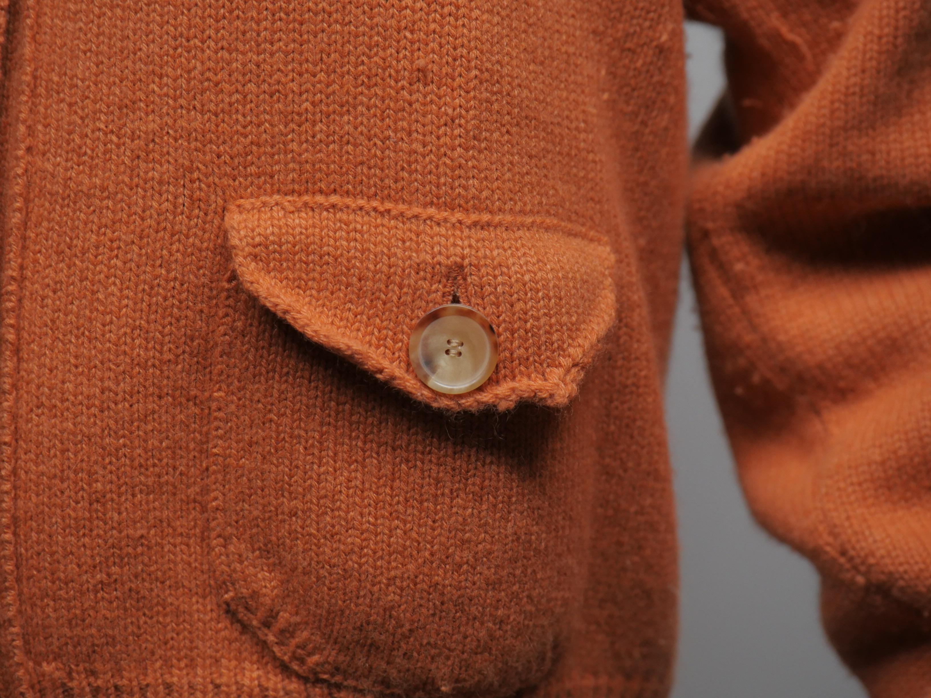 orange button sweater