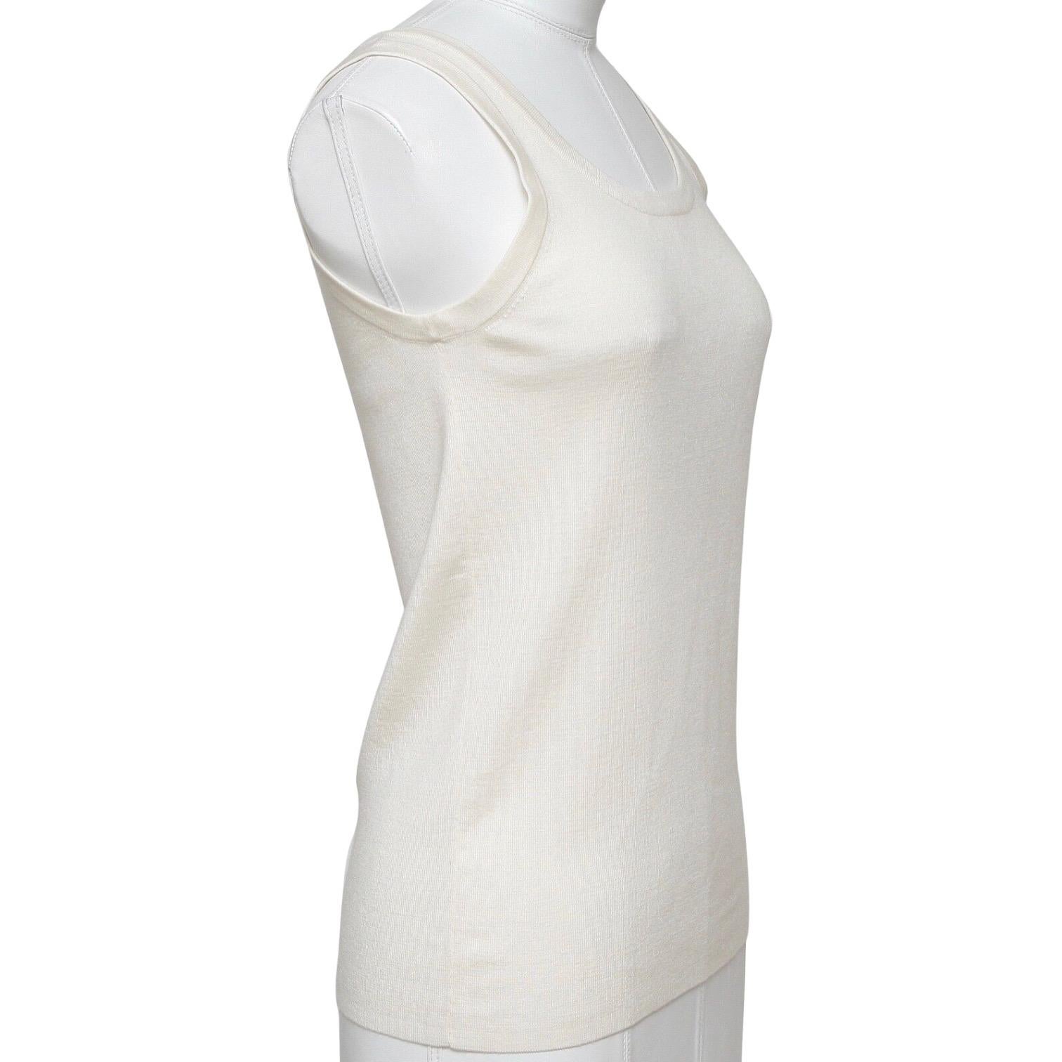 
Design:
- Classic sleeveless knit top in a neutral cream color.
- Pullover.
- Lightweight.

Size: US 8, F 40

Material: 100% Wool

Measurements (Approximate laid flat, material has a good amount of give):
- Underarm to Underarm: 15