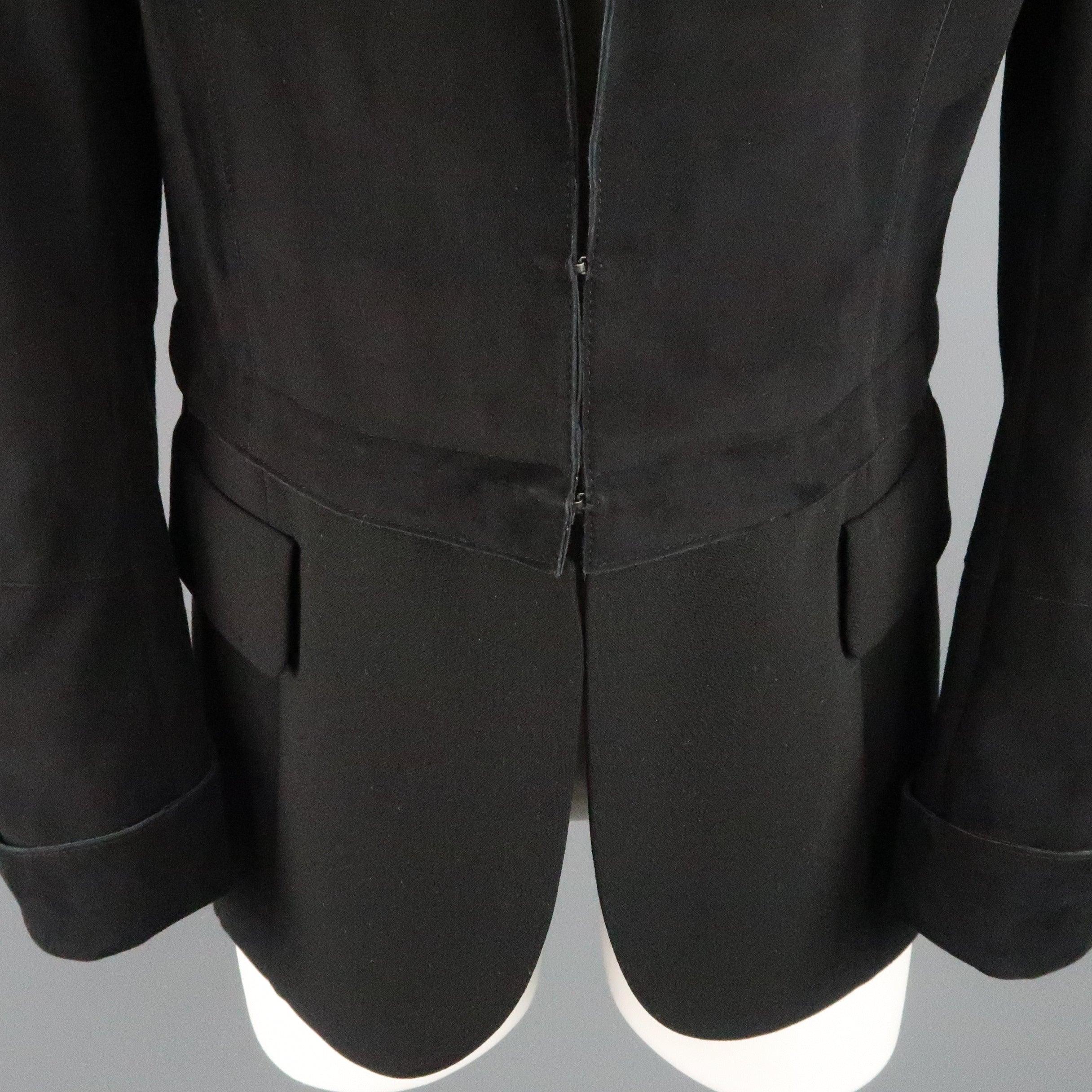 AKRIS blazer comes in black suede and features a classic notch lapel, double hook eye closure, and detachable zip off wool panel with faux flap pockets. 
 Excellent Pre-Owned Condition.
  
 

 Marked:  US 10
  
 

 Measurements: 
  
 l Shoulder: 15