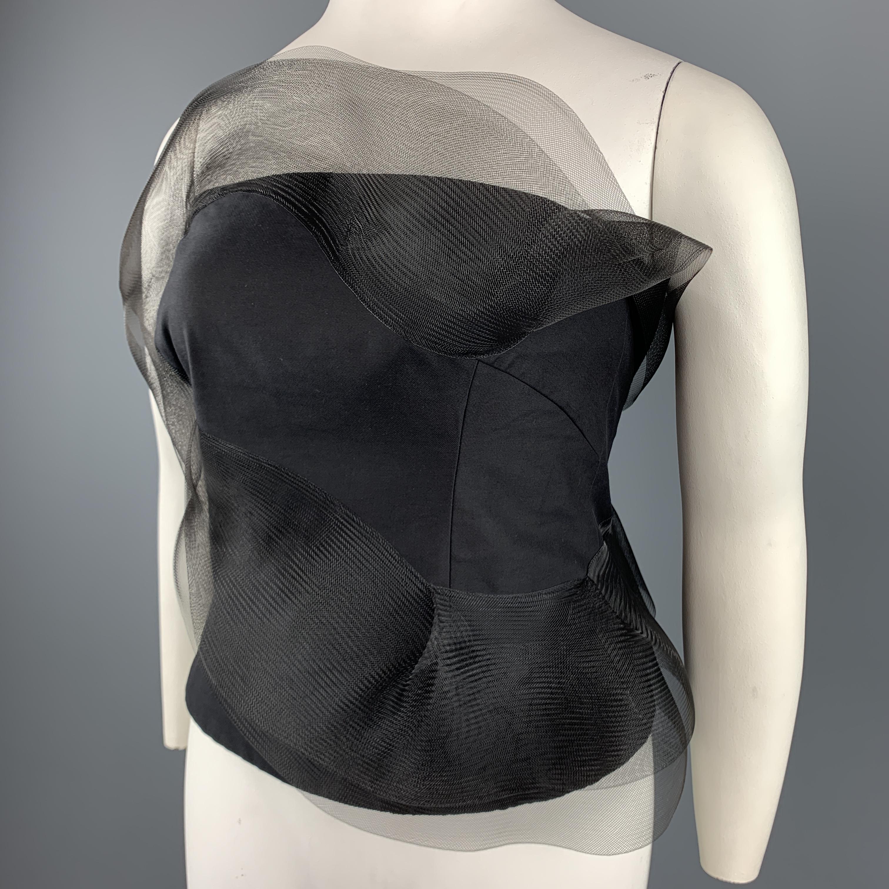 AKRIS bustier top comes in a cotton silk blend twill with a strapless neckline and asymmetrical tulle mesh ruffle accent throughout. 

Excellent Pre-Owned Condition.
Marked: 12

Measurements:

Bust: 39 in.
Waist: 34 in.
Length: 15.5 in.