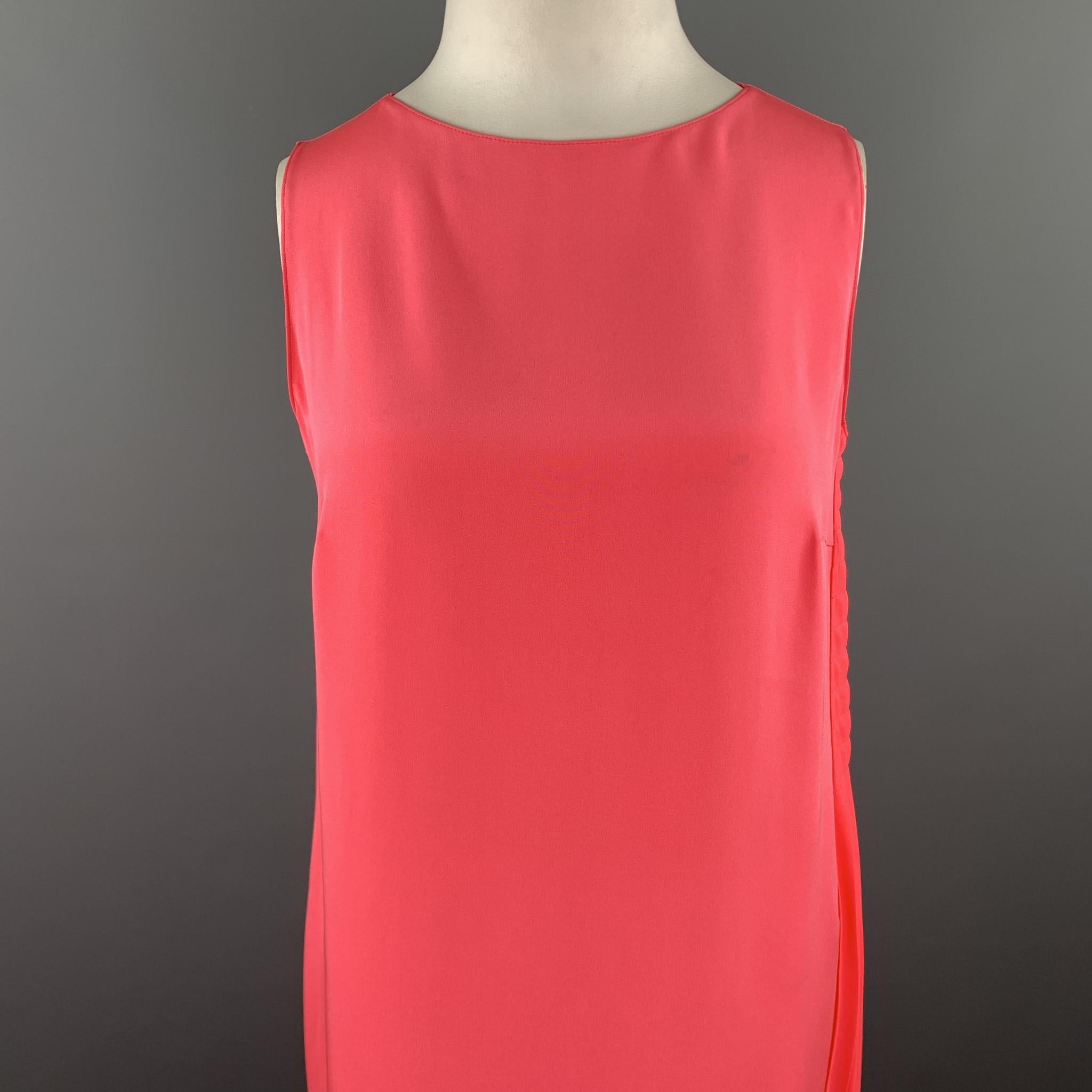 Sleeveless AKRIS shift dress comes in bold pink silk crepe chiffon with a round neckline and asymmetrical pleated side sash detail. 

Excellent Pre-Owned Condition.
Marked: US 12

Measurements:

Shoulder: 14 in.
Bust: 42 in.
Waist: 42 in.
Hip: 42