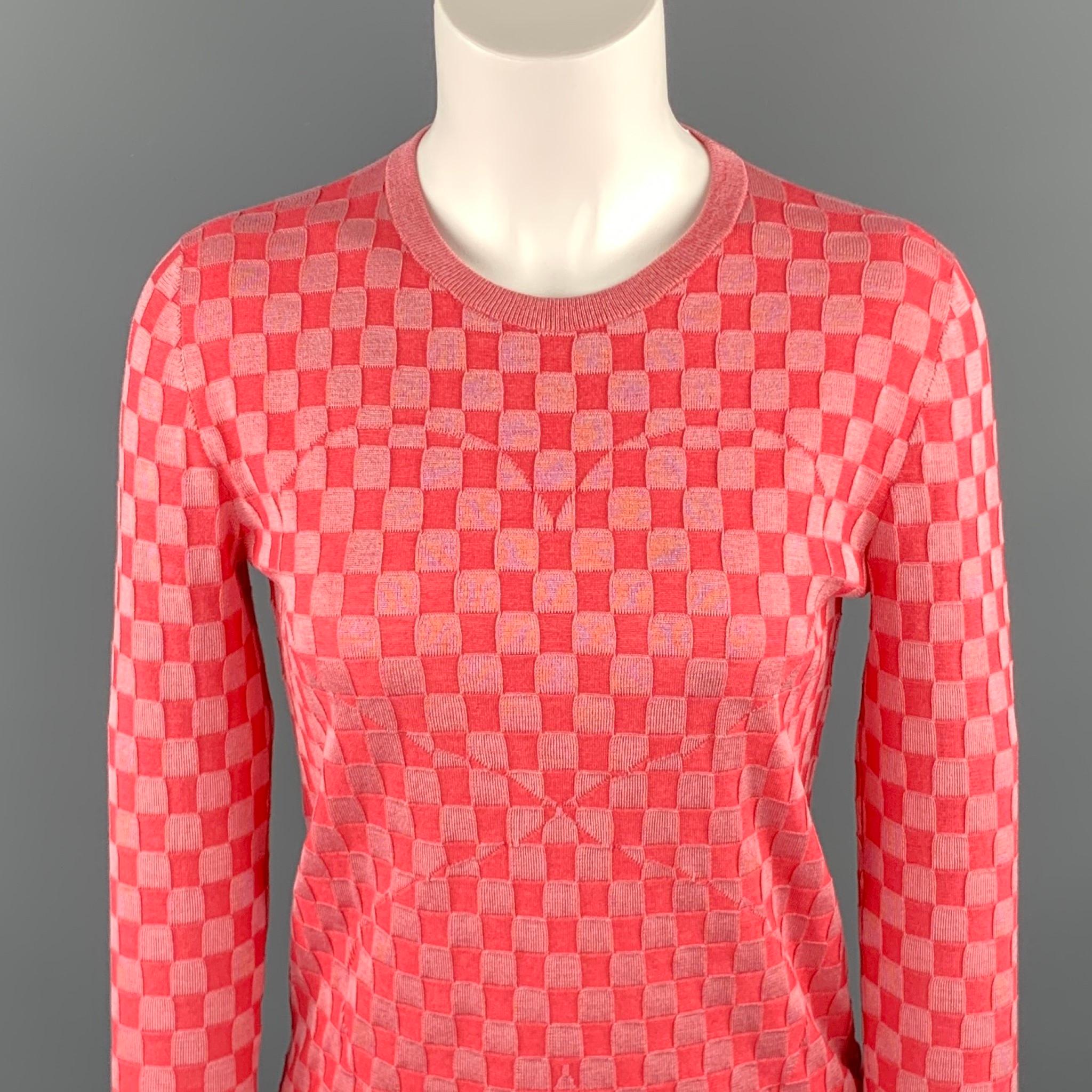 AKRIS pullover comes in a pink checkered silk blend with a hidden heart design featuring a crew-neck. 

Excellent Pre-Owned Condition.
Marked: US 2

Measurements:

Shoulder: 15.5 in. 
Bust: 34 in. 
Sleeve: 21.5 in. 
Length: 21 in.