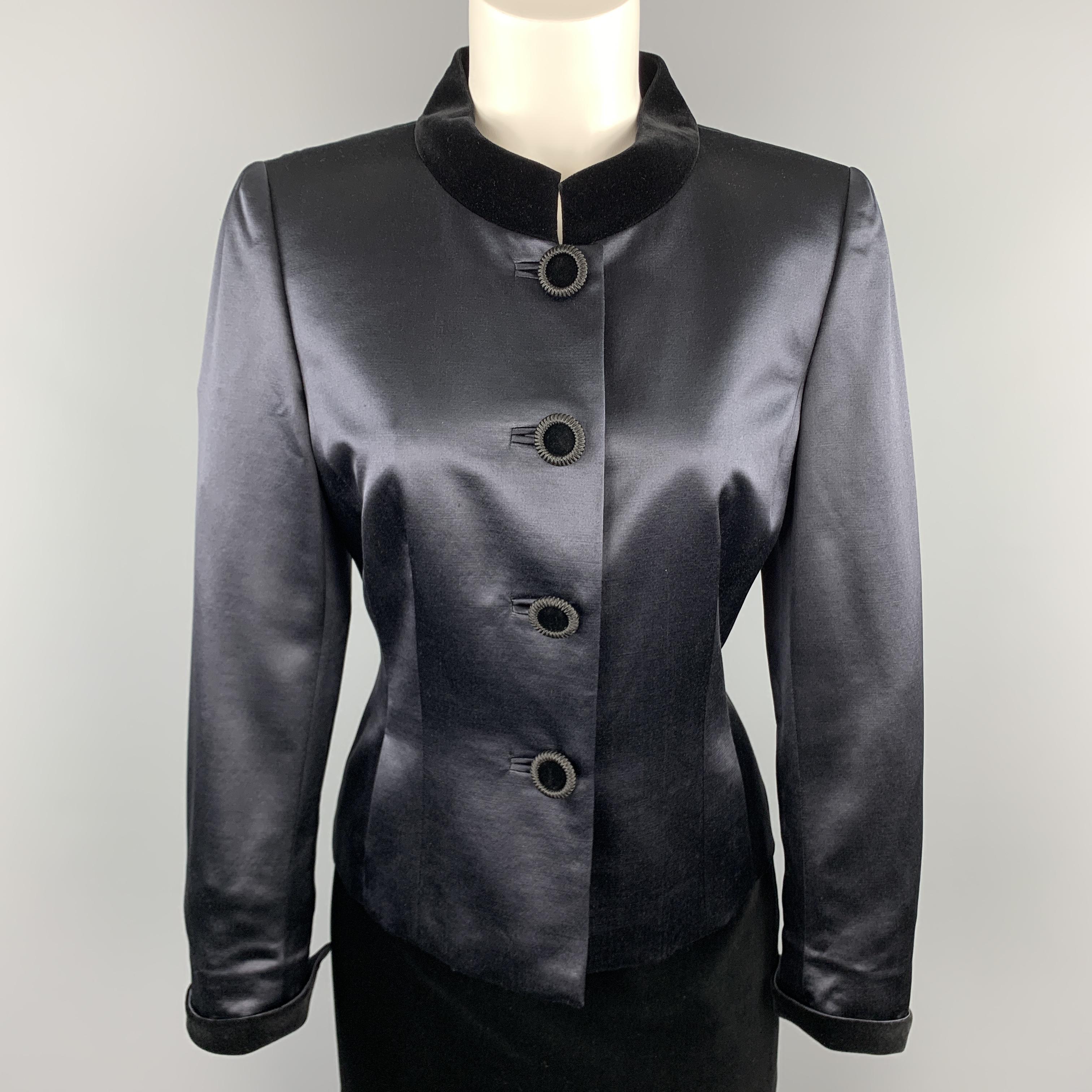 AKRIS skirt suit includes a navy wool sateen single breasted jacket with a stand up black velvet collar and button up front with matching black velvet pencil skirt. 

Very Good Pre-Owned Condition.
Marked: US 8

Measurements:

-Jacket
Shoulder: 15