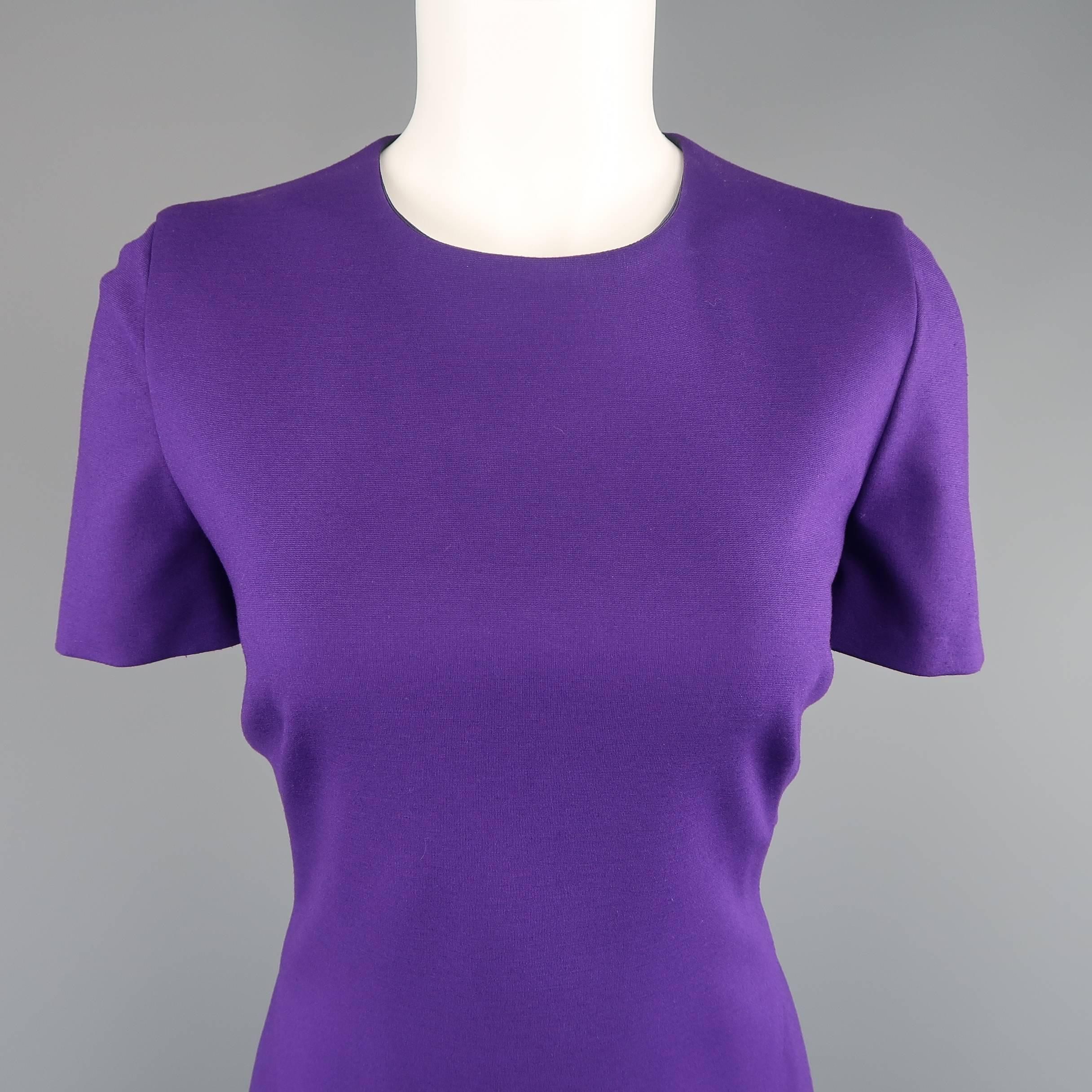 AKRIS dress comes in a purple jersey knit with a round neckline, short sleeves and fitted flair A line silhouette.
 
New with Tags.
Marked: 8
 
Measurements:
 
Shoulder: 14 in.
Bust: 36 in.
Waist: 31 in.
Hip: 36 in.
Sleeve: 8 in.
Length: 40 in.
