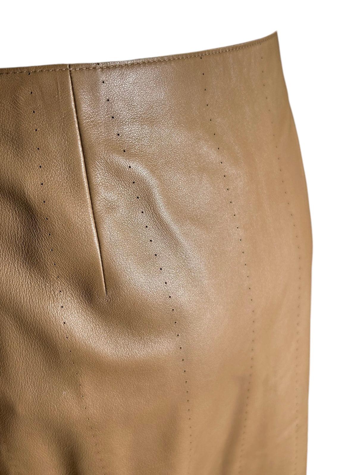 Gorgeously darted nappa lamb leather skirt. The softest leather and luxuriously outfitted with delicate pinhole detailing. Side zipper. Lined with satin. Labeled a US 8. Unworn and in excellent condition.

Additional information:
Color: Beige
Size: