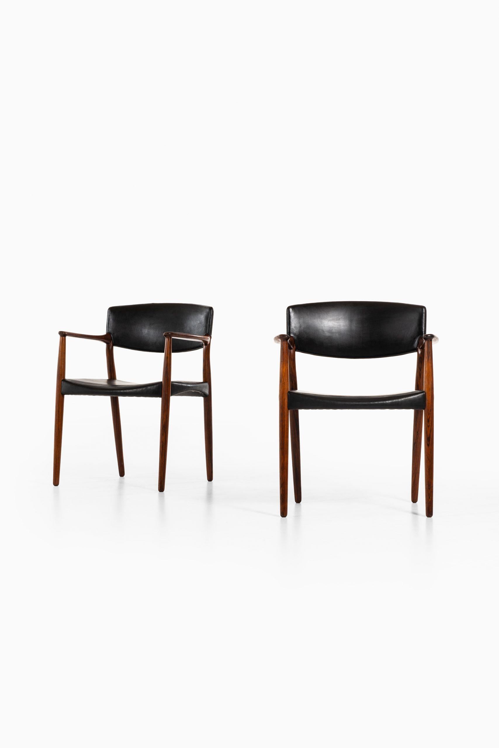 Rare pair of armchairs designed by Aksel Bender Madsen & Ejner Larsen. Produced by cabinetmaker Willy Beck in Denmark.