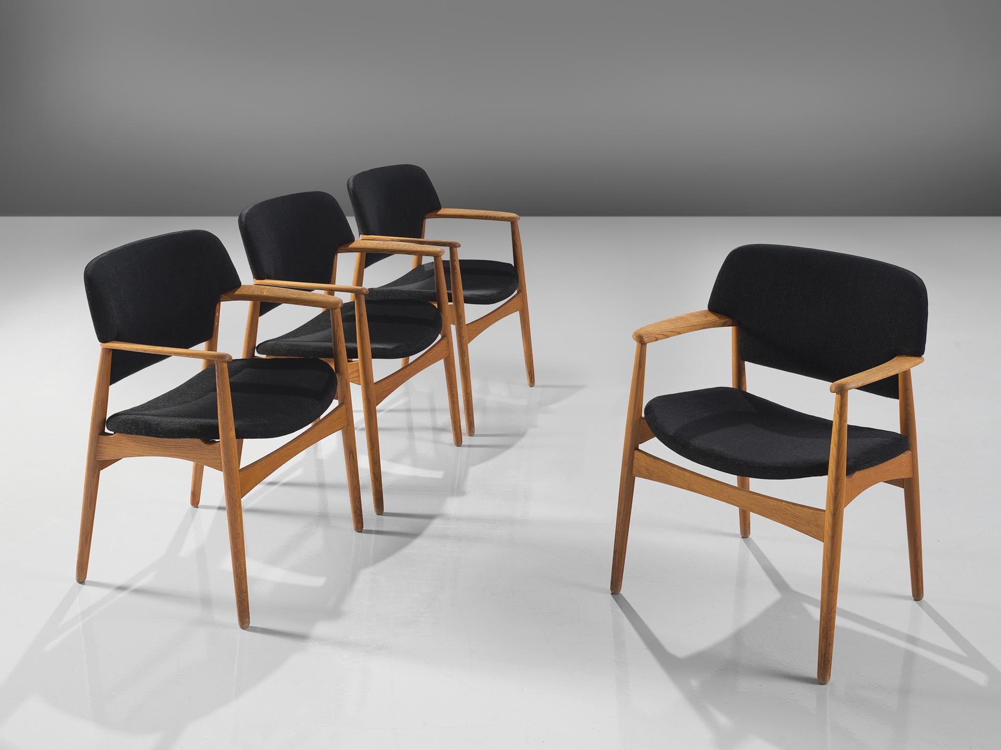 Aksel Bender Madsen for Fritz Hansen, set f four dining chairs, oak, black upholstery, Denmark, circa 1955

This set of four Danish dining chairs feature a blond oak frame that forms a great colour palette with the black fabric. The chairs are solid