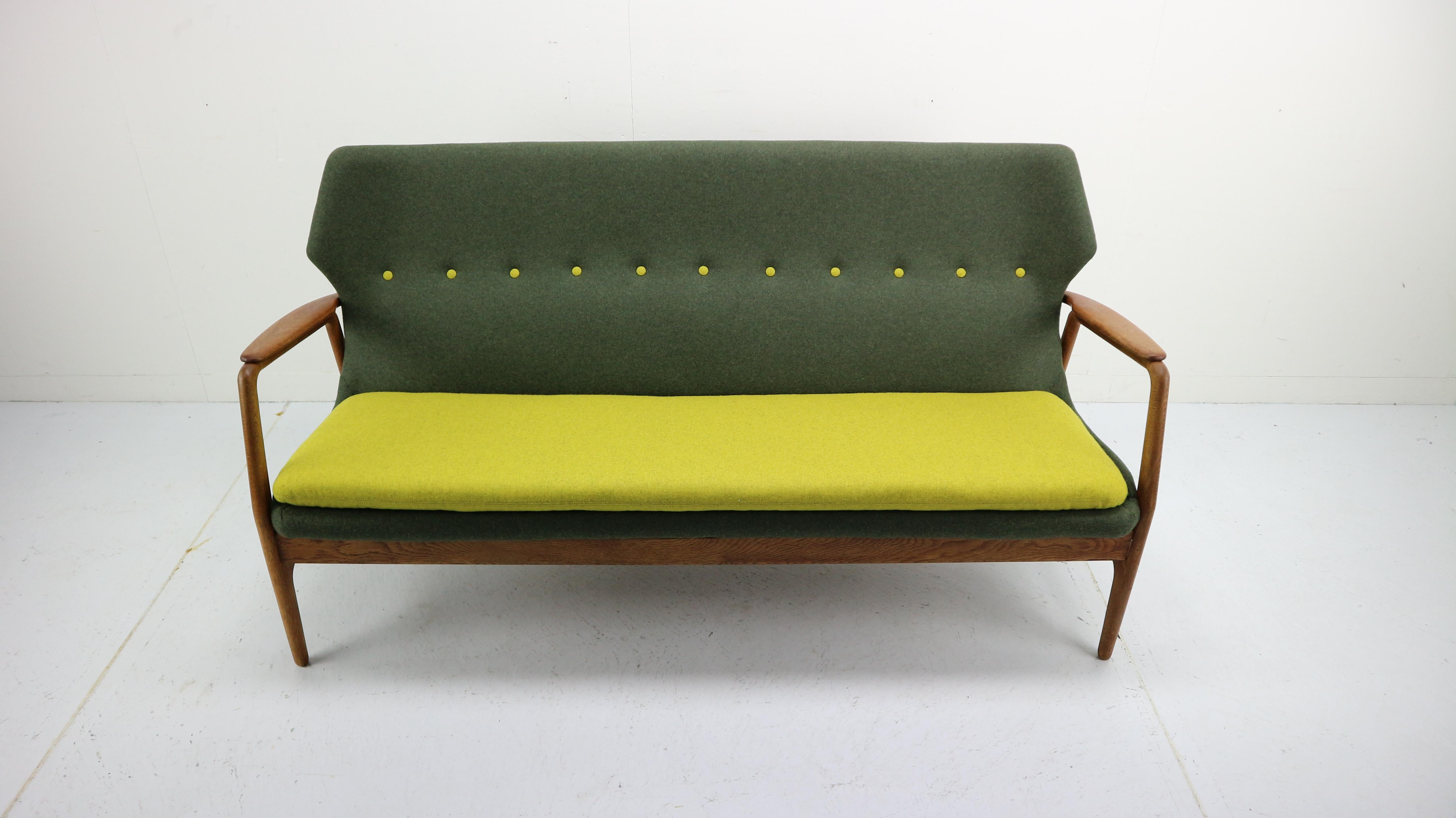 Lounge sofa wingback 3-seat, designed by Aksel Bender Madsen. Aksel Bender Madsen worked for Bovenkamp in the 1950s and 1960s, this sofa was produced in 1958. Madsen helped Bovenkamp to integrate Danish craftsmanship in their furniture making. Very