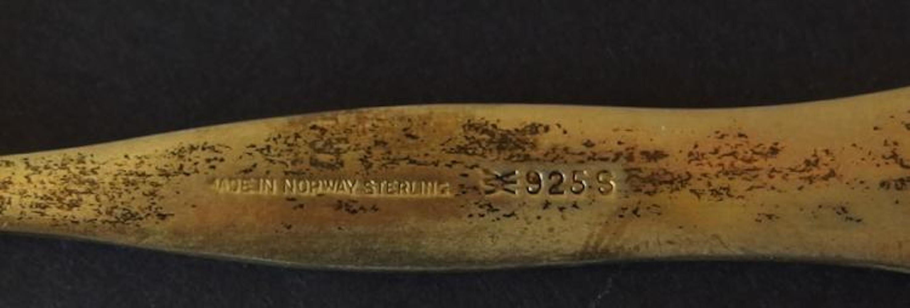Set of six Norwegian gilt sterling silver guilloche demitasse spoons. Each marked 'Made in Norway 925 S' along with makers mark,. Comes with Magnus Aase box TW 67.9 grams Size: Each 4