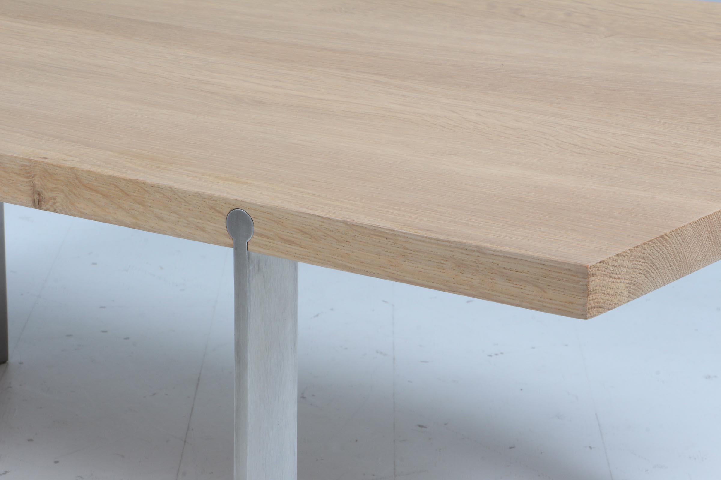 Danish Aksel Kjersgaard coffee table in oak and stainless steel.